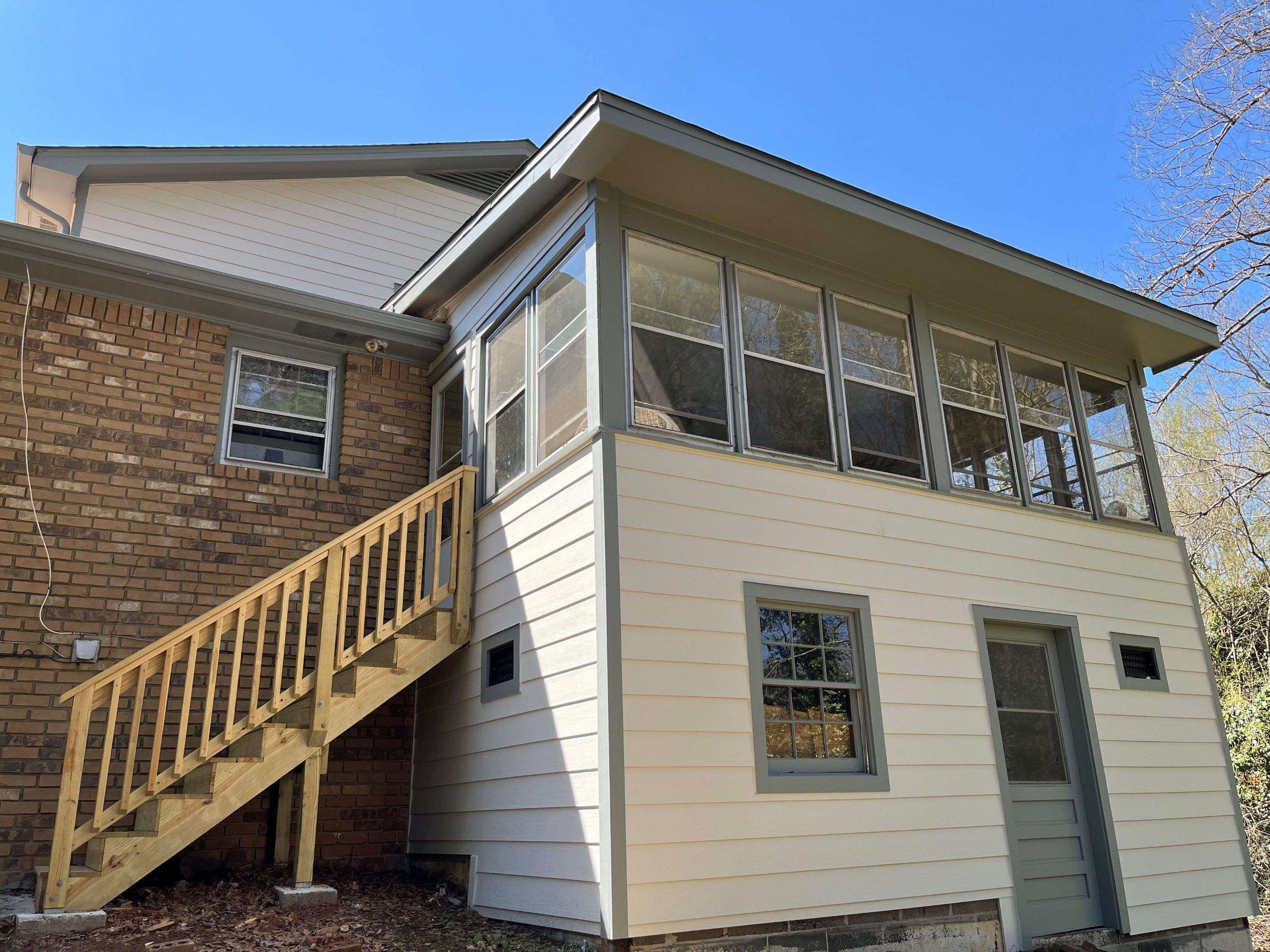 Board and Batten Siding Installation and Railing Replacement in Lilburn, GA by Nelson Exteriors 