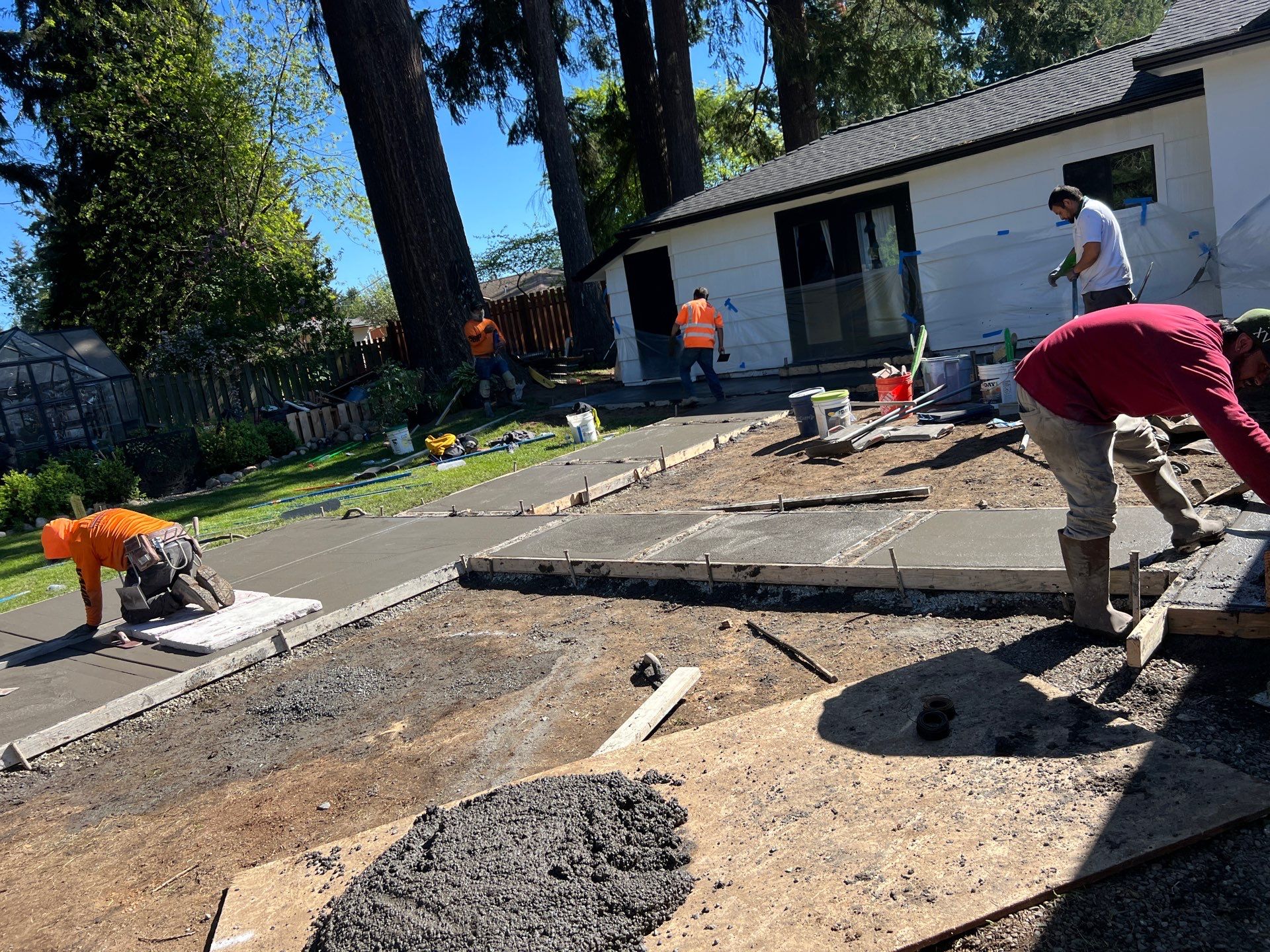 John | Concrete Backyard Walkway by Jireh Asphalt & Concrete Inc 