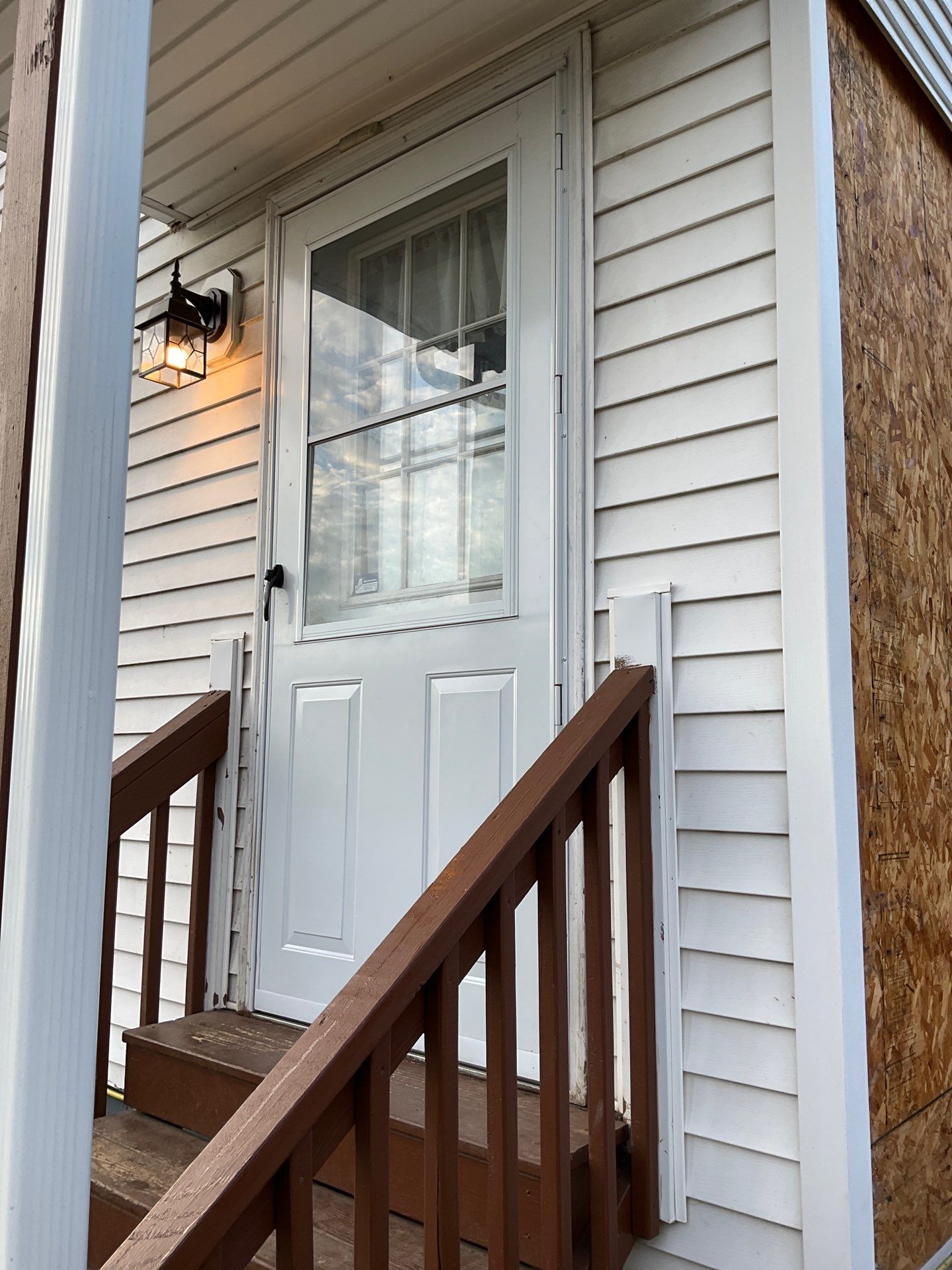 Charcoal Metal Roof & Blue Siding — A Refreshing New Look by Esh Builders