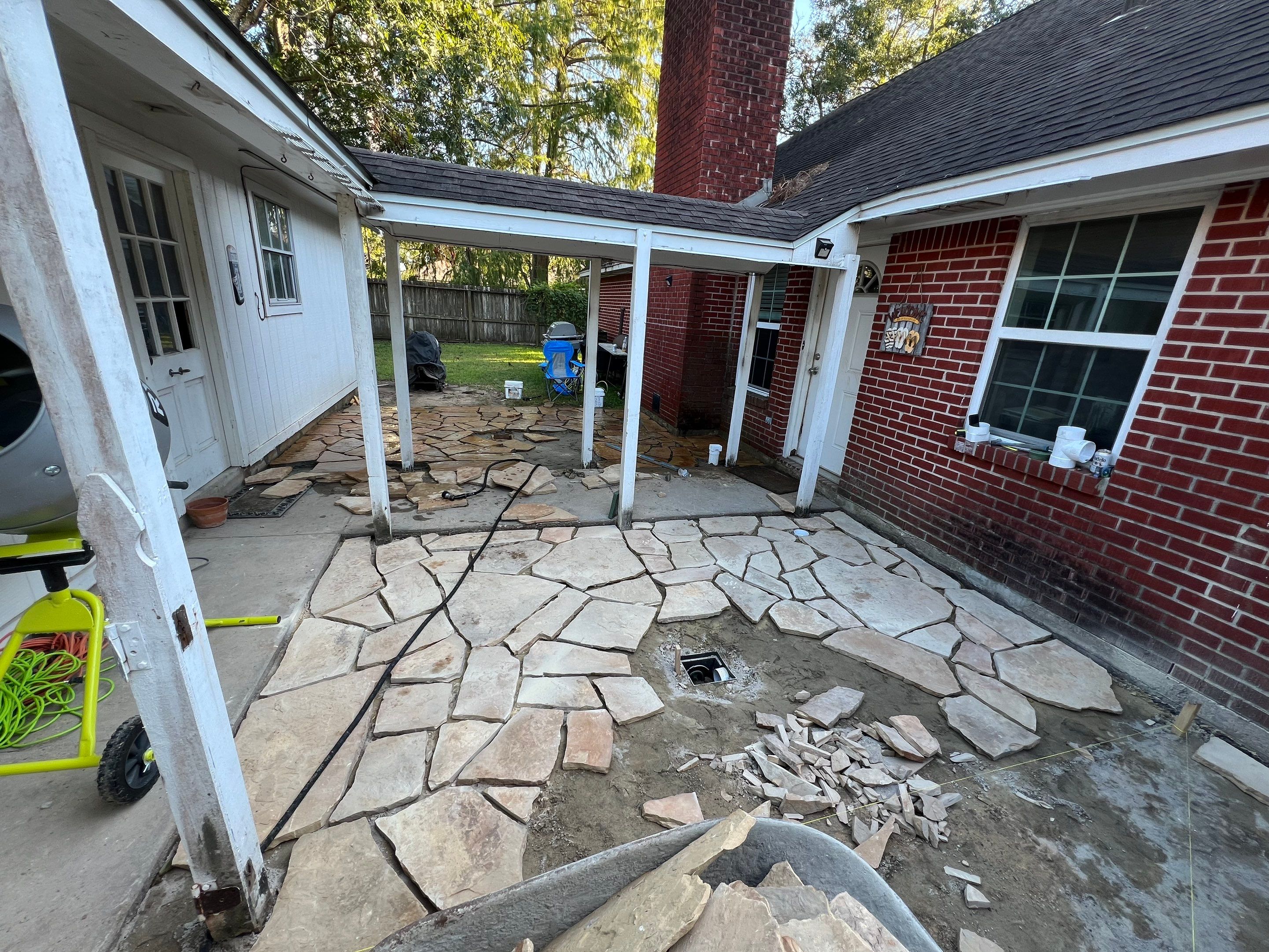 🌿 Rodney – Full Gutters, Drainage System, Flagstone Patio & Pergola  Alejandro and the Texas Urban Elements Team recently completed a multi-solution project for Rodney’s home, blending function with design.  ✅ Seamless Gutters We installed a complete 6” seamless gutter system around the home to properly redirect rainwater away from the foundation, protecting siding, paint, and landscaping while boosting curb appeal.  ✅ Drainage System A new PVC storm drainage system was integrated into the gutters and extended to carry roof runoff away from the house. This ensures water won’t pool near the foundation or the new patio area.  ✅ Flagstone Patio Ground We prepped, leveled, and installed a custom flagstone patio for Rodney—delivering both beauty and durability, creating a natural, timeless look that ties perfectly into the yard.  ✅ Pergola Addition To conclude, our framing team constructed a small pergola extension, providing Rodney’s patio with a shaded retreat for family and friends to enjoy.  ✨ Result: A fully protected and enhanced outdoor living space where drainage, stonework, and structure all work together for long-lasting performance and comfort.  📢 At Texas Urban Elements, we specialize in building solutions that protect homes while creating beautiful outdoor environments. by Texas Urban Elements