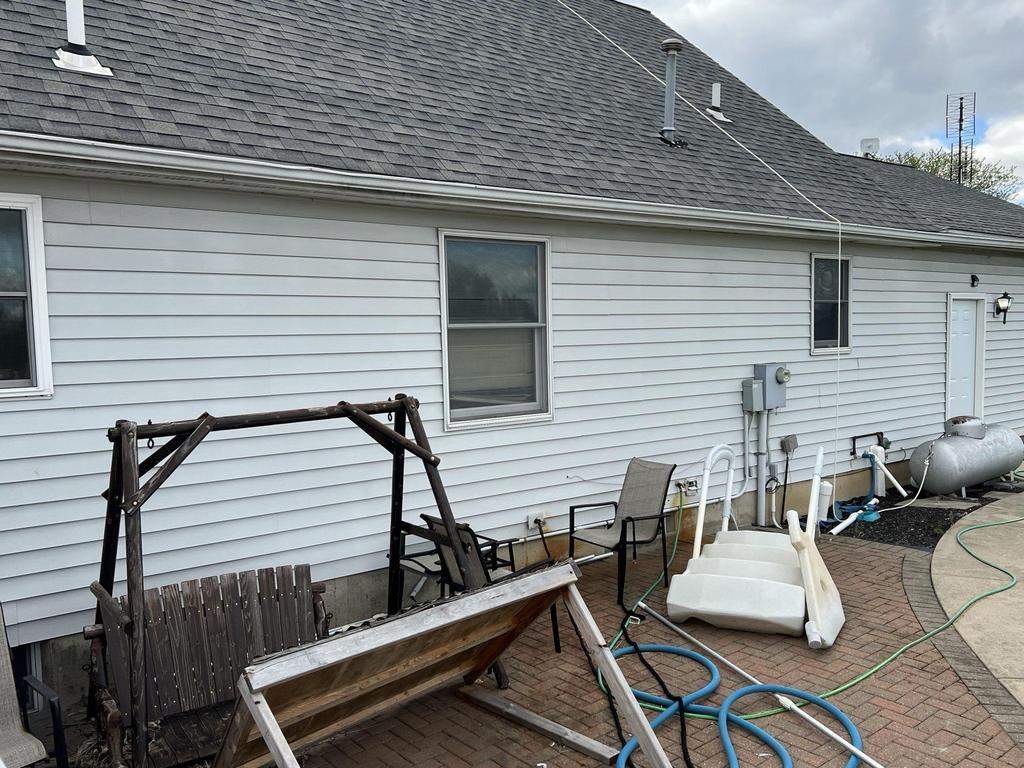 Residential Roofing Installation using Metstar Slate Plus Smooth Black by Nitro Roofing and Construction