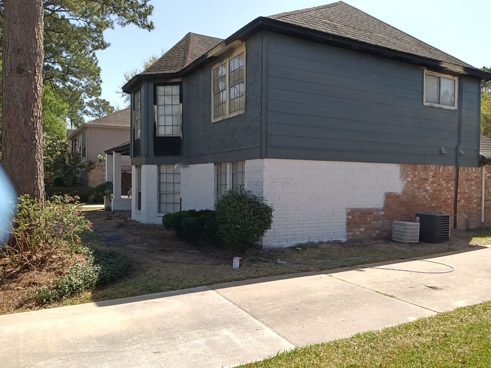 Interior and exterior painting project by Roof Concepts Construction