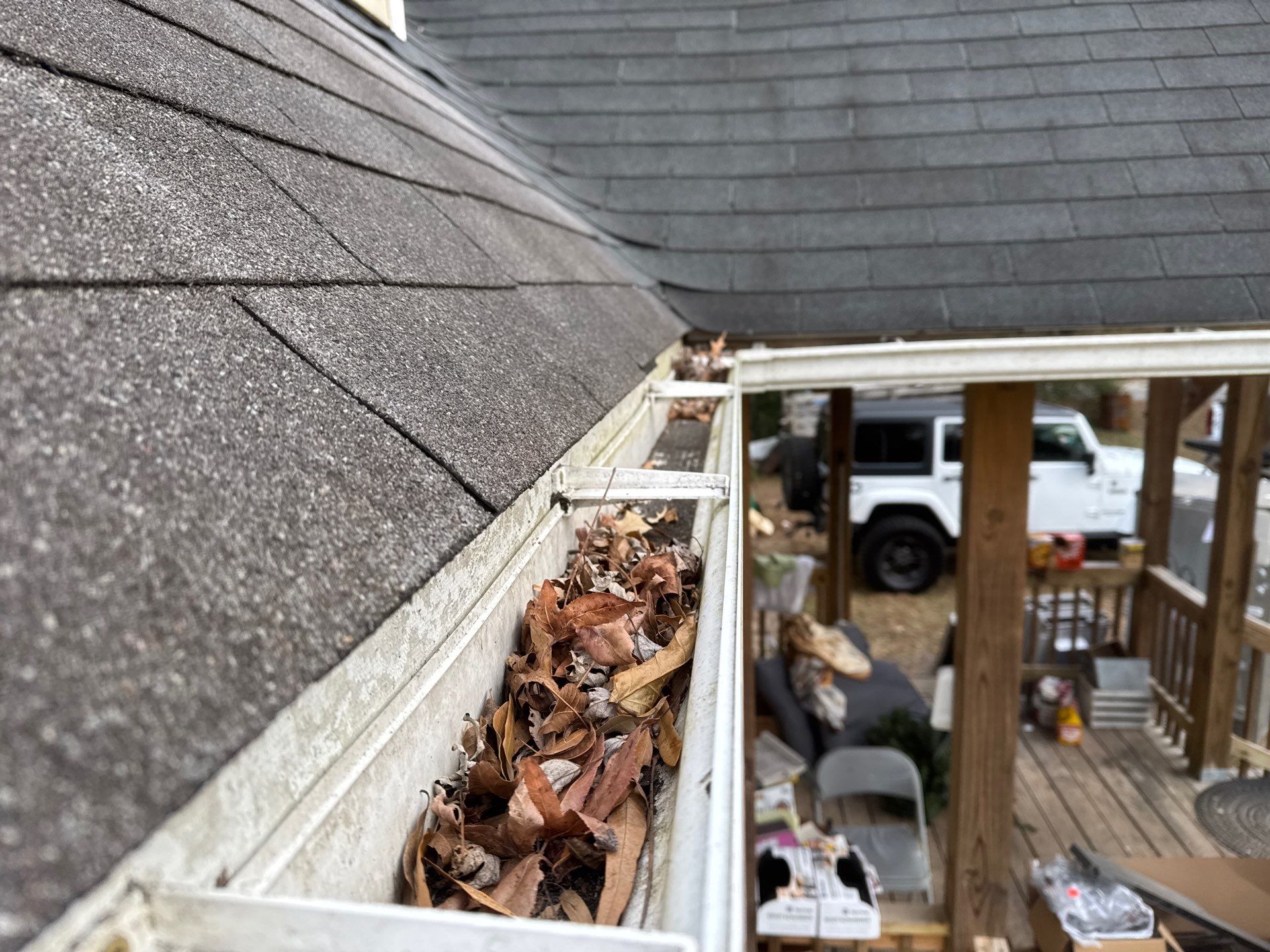 Gloucester Exterior Overhaul with Navy Blue Siding and New Roof by Cade Construction