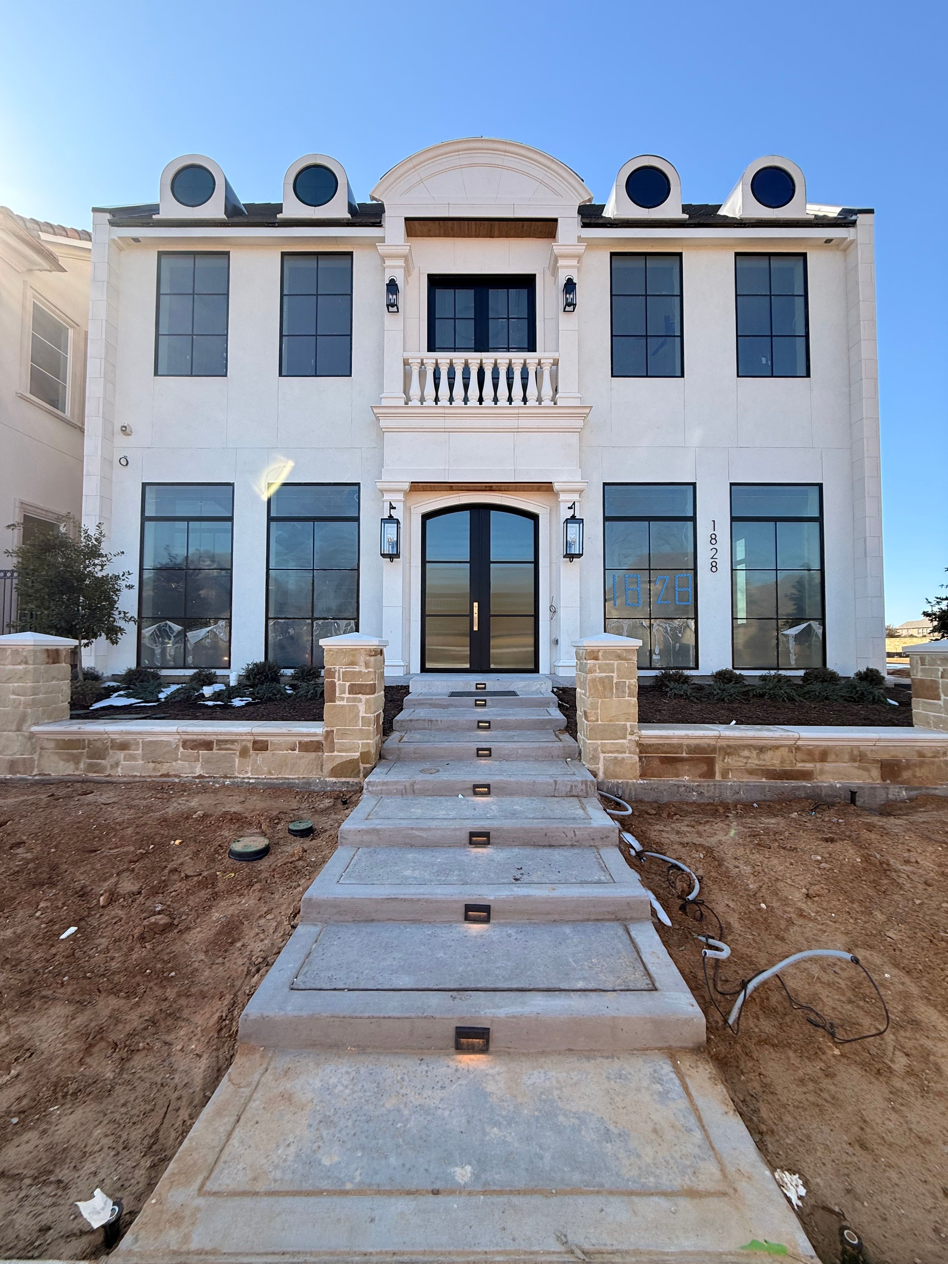 Custom Arched Entry Door Installation and Finishing in Southlake by Solara Custom Living
