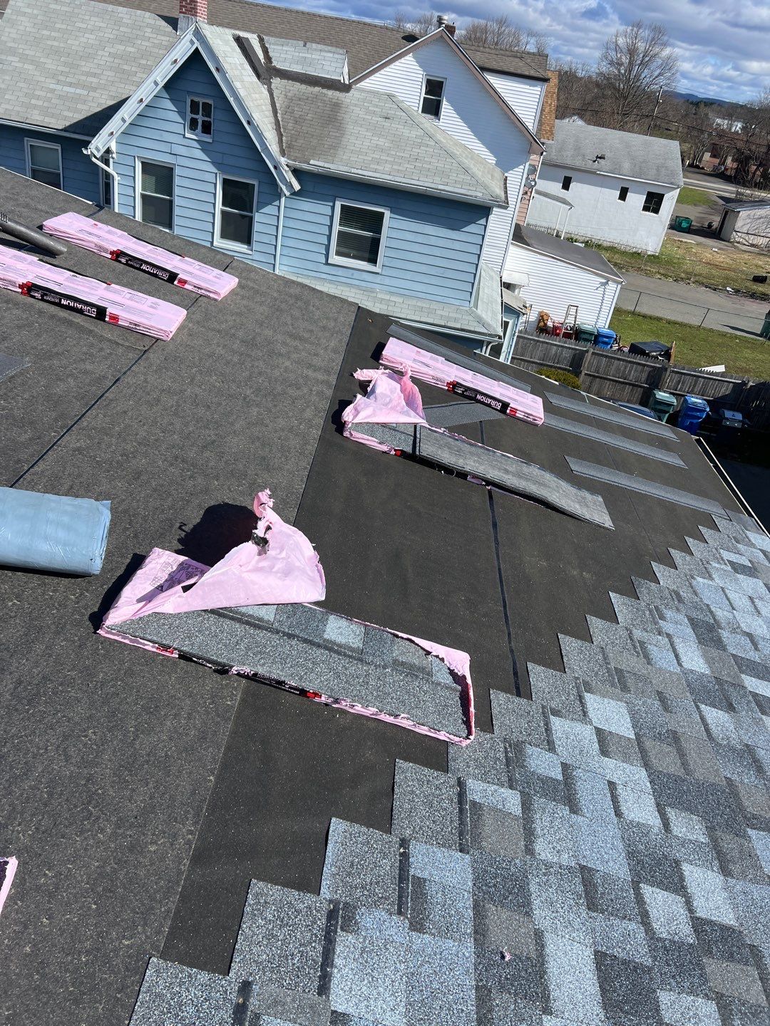 Atlantic Blue Shingles by Reimagine Roofing