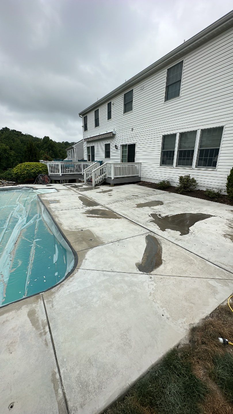 Pool Deck + Driveway + Garage Project in Venetia by Floors in a Day, Inc