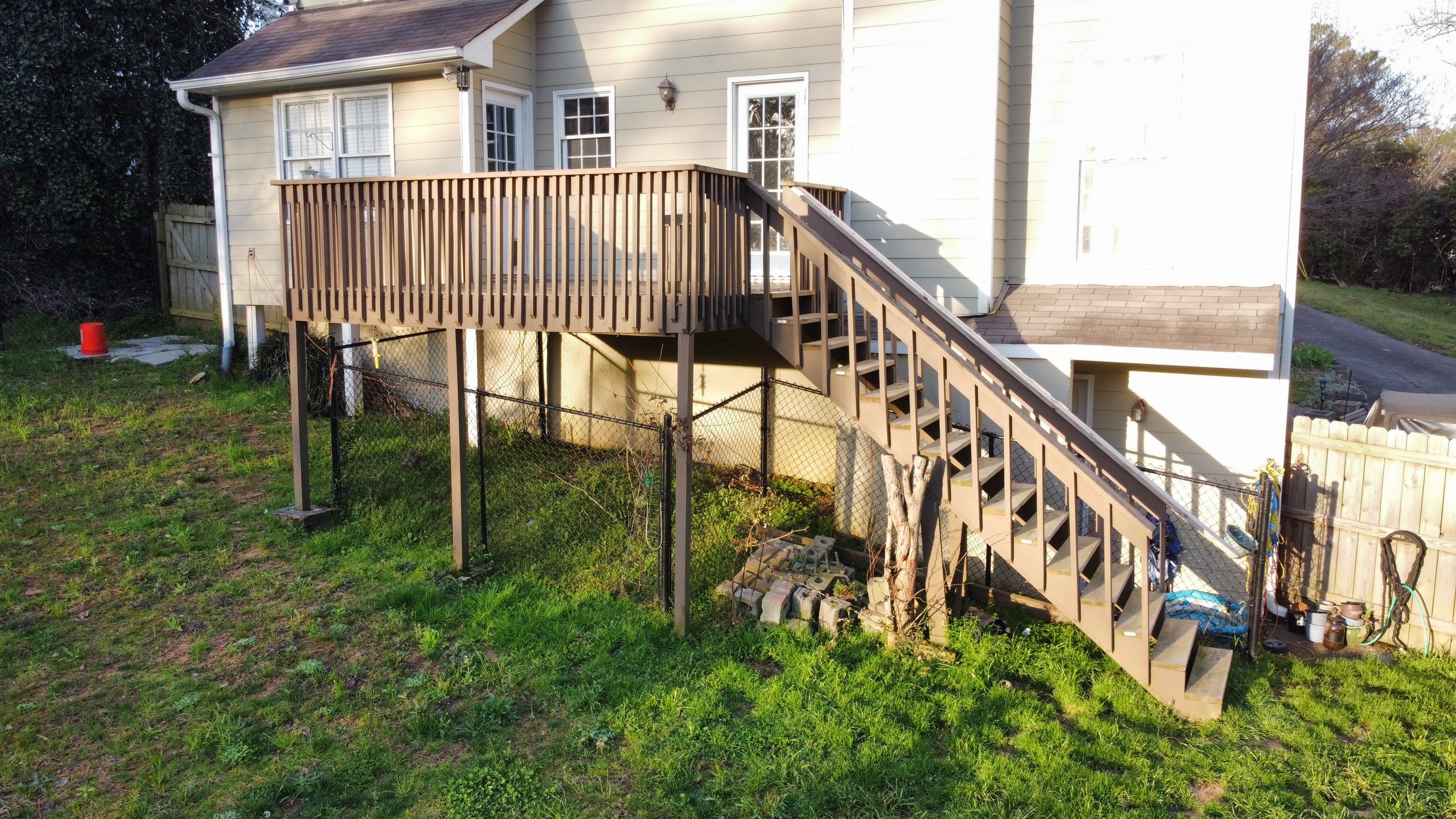 Elevated Pressure-Treated Wood Deck Replacement in Marietta by Swift Home Renovations
