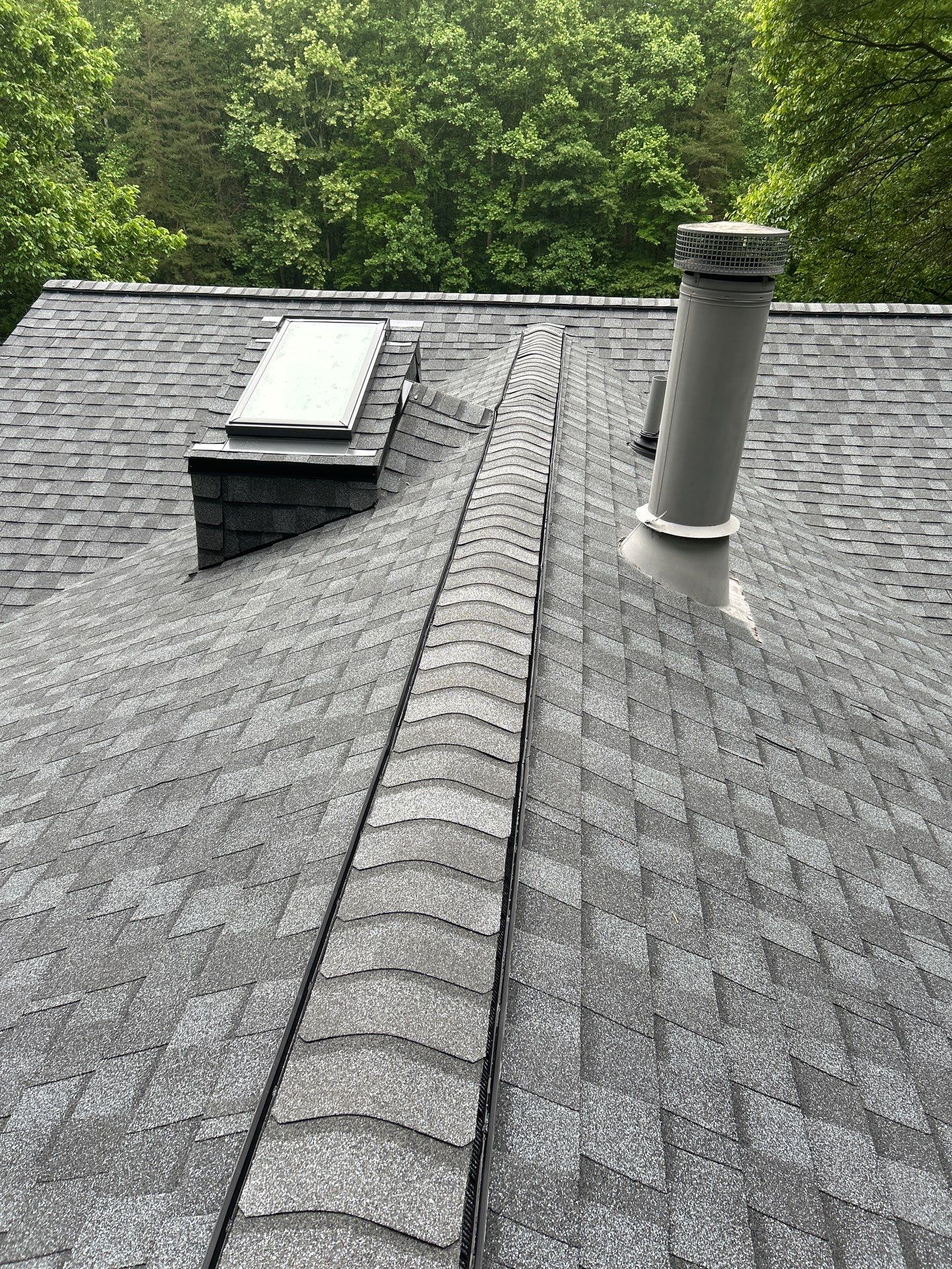 Oakton: Roof Replacement With CertainTeed Landmark Designer Shingles in Pewter by RM Banning, Inc.
