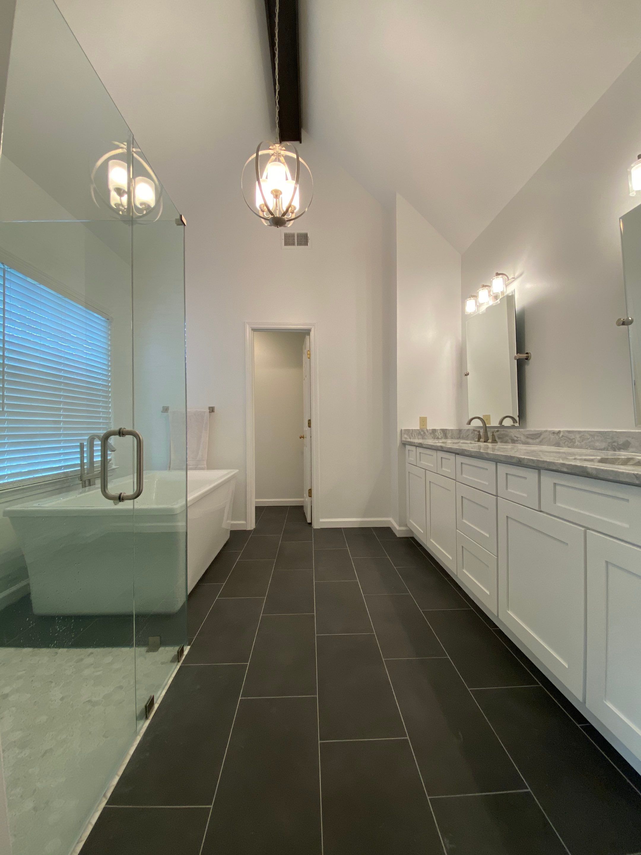 Modern Master Bathroom Remodel with Stacked Stone in Kennesaw by Swift Home Renovations