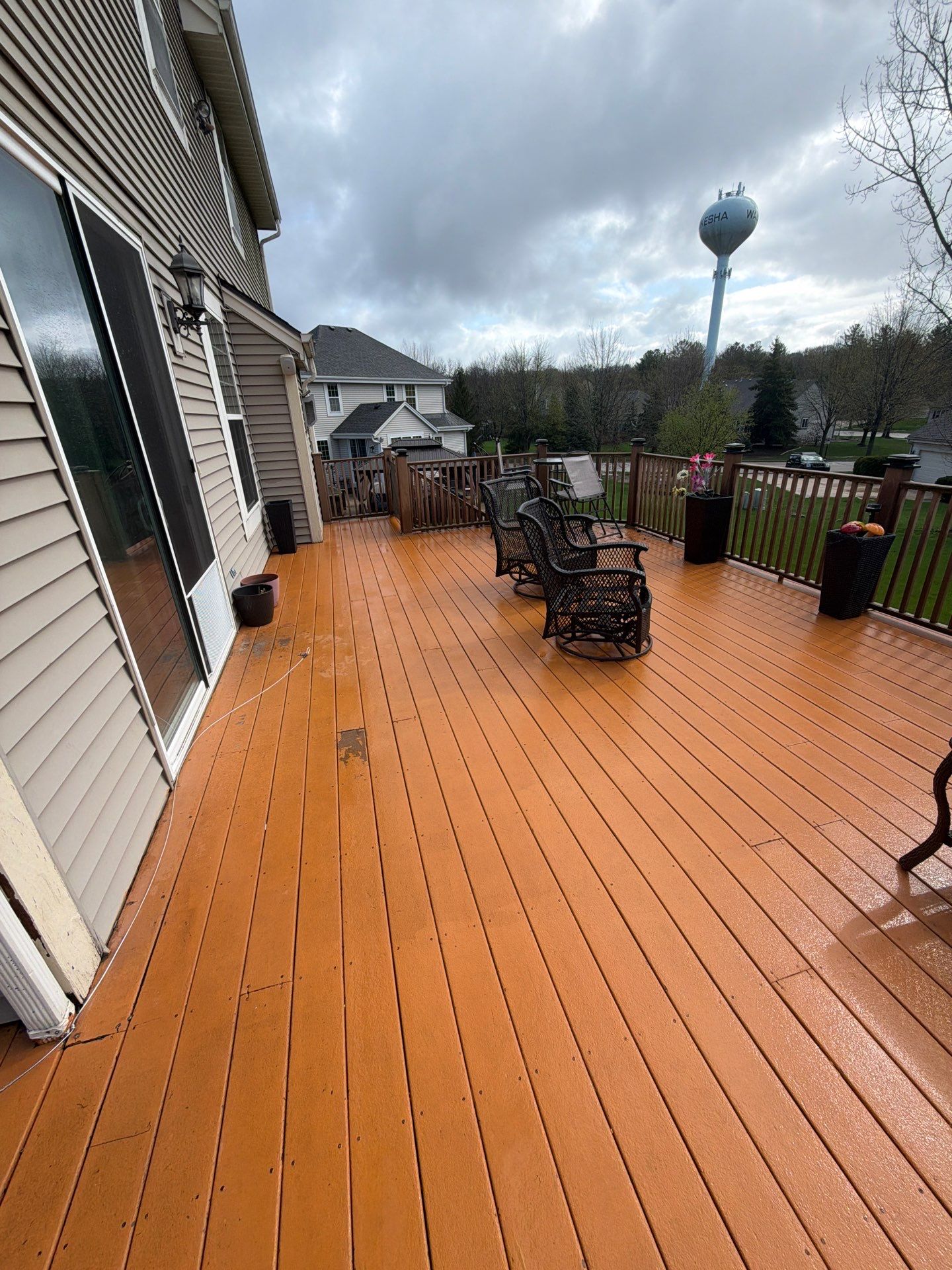 Elevated Wood Deck Refinishing and Railing Restoration in Waukesha by OCS Contracting Services