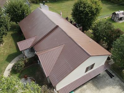 Residential Roofing Installation using Metal