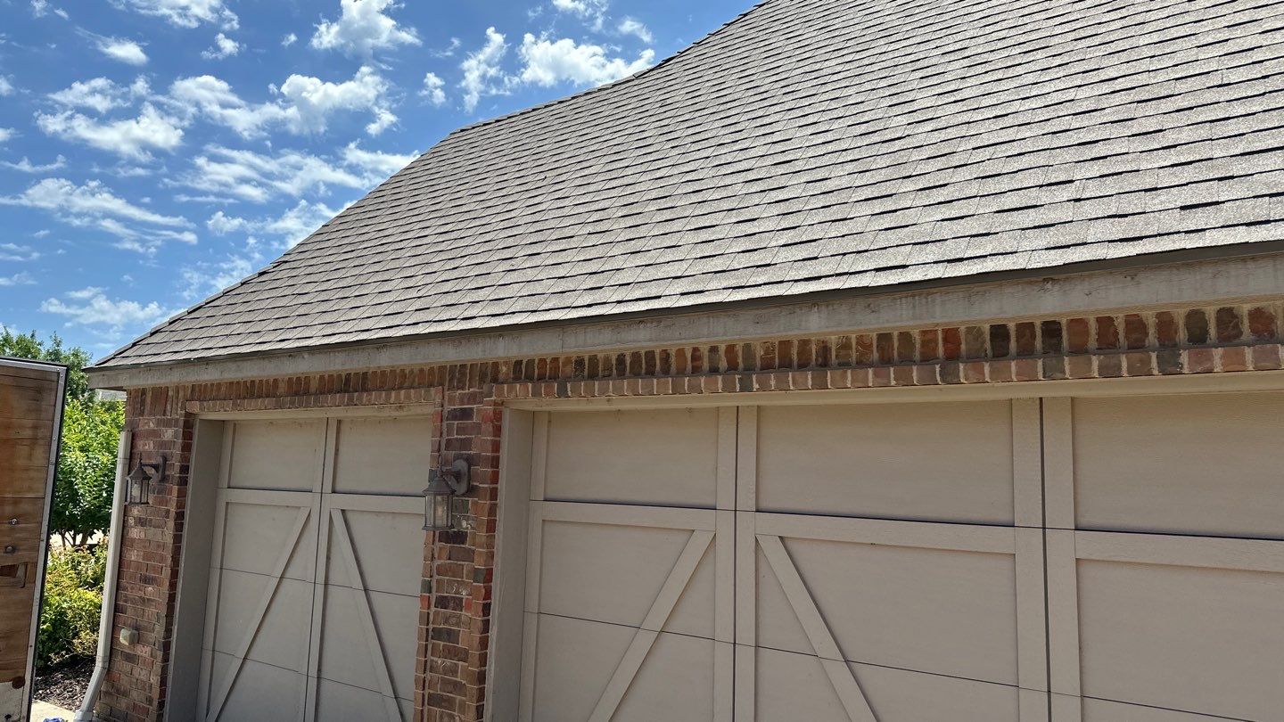Roof Replacement and Gutter Installation in Edmond, OK by McCann's Roofing and Construction