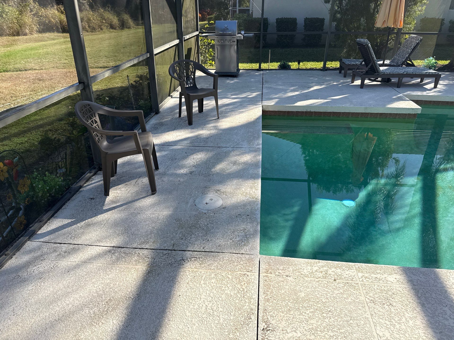 Painted Pool Deck, Lanai & Pool Cage Cleaning in River Club South – Bradenton, FL by Sunshine AquaWash