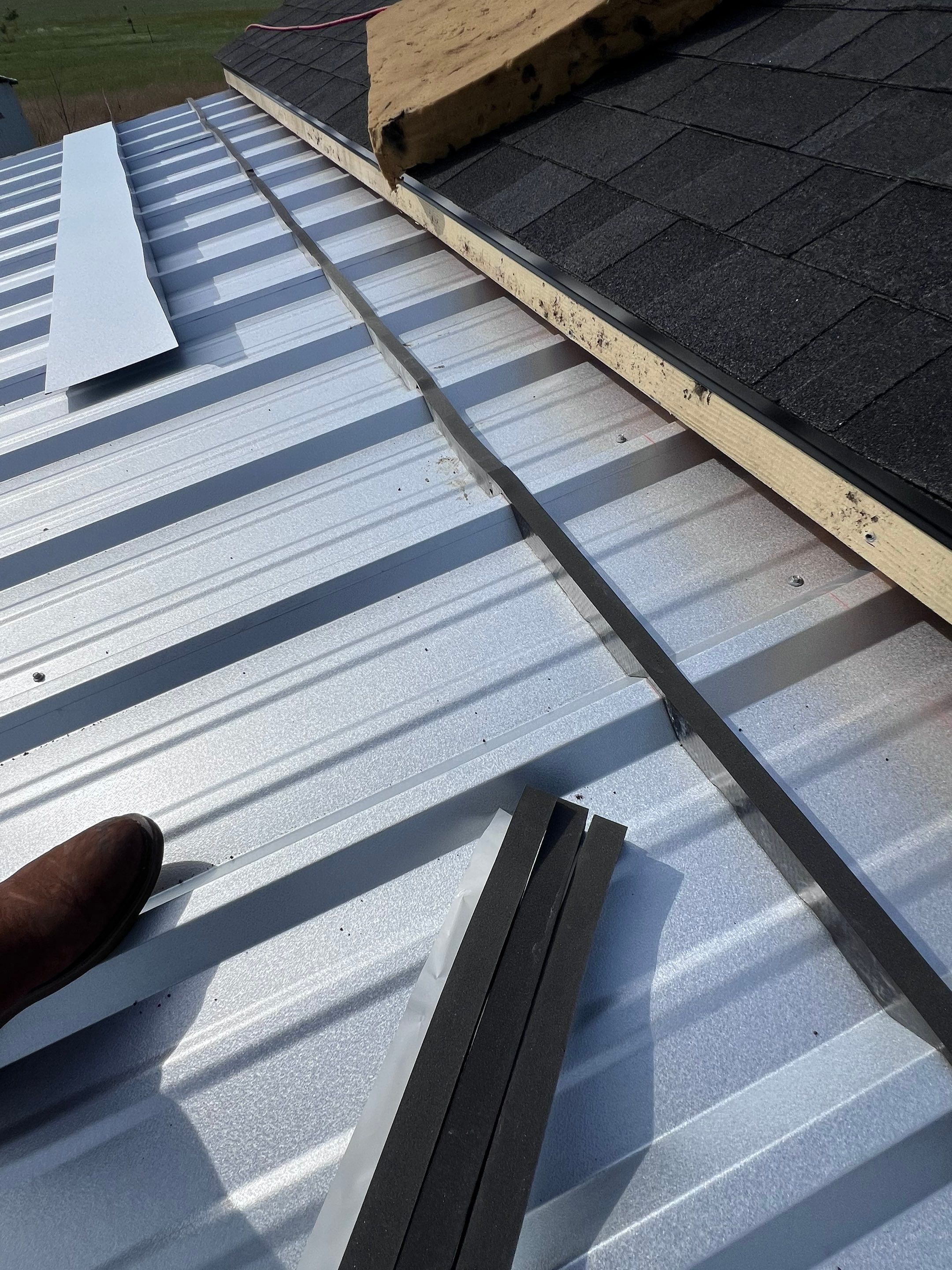 Residential Roofing Installation using Metal by Roof Repair Company