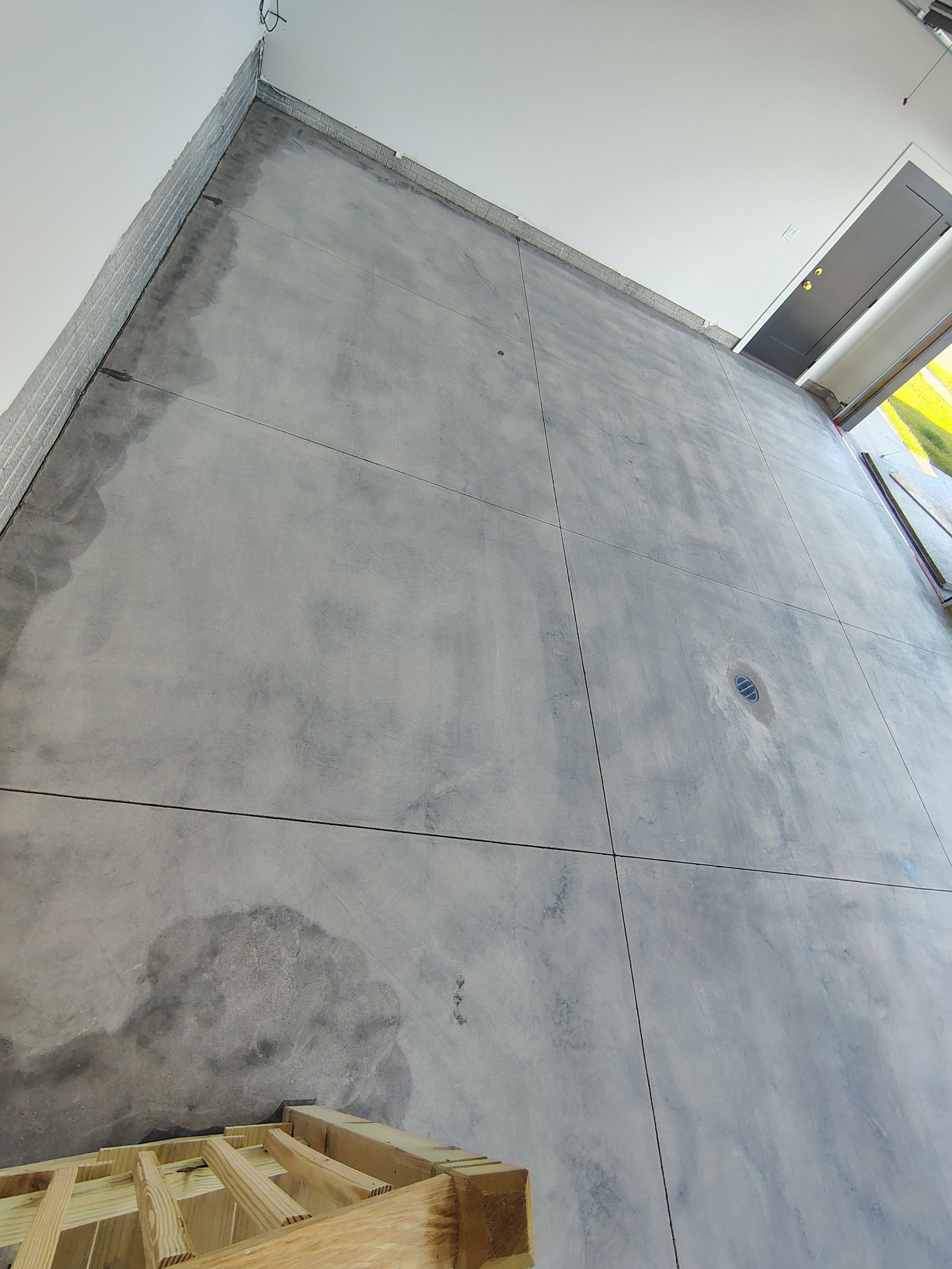 Cabin Fever Decorative Flake Garage Floor Coating in Sioux Falls by Select Painting, Coatings & Garage Cabinets