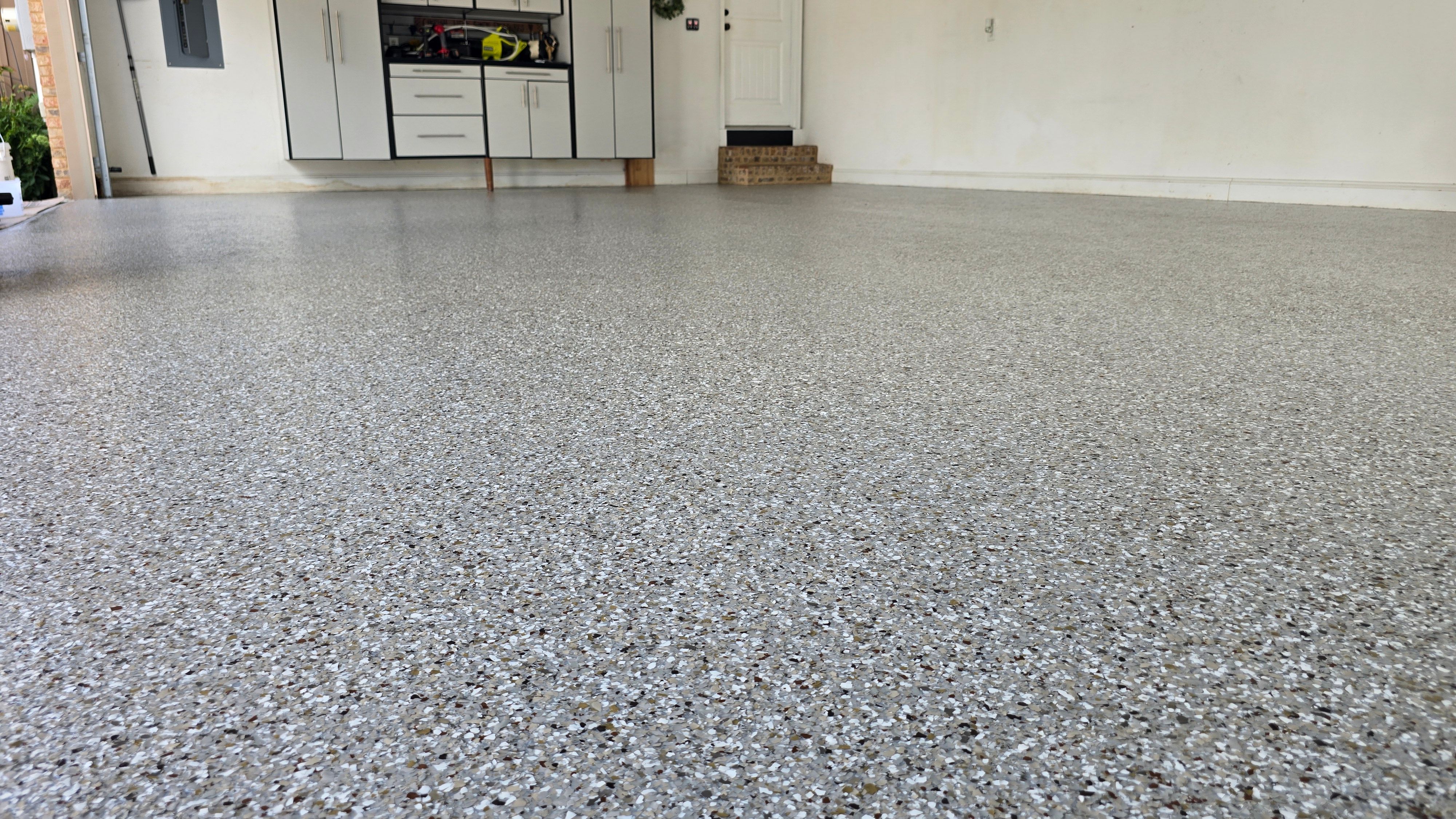 Garage Using Creekbed by Elite Floor Solutions