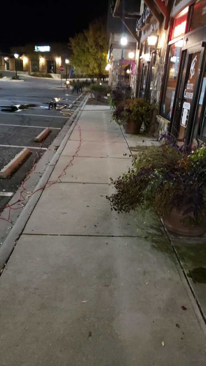 contrete cleaning using cleaner by Power Wash Masters LLC