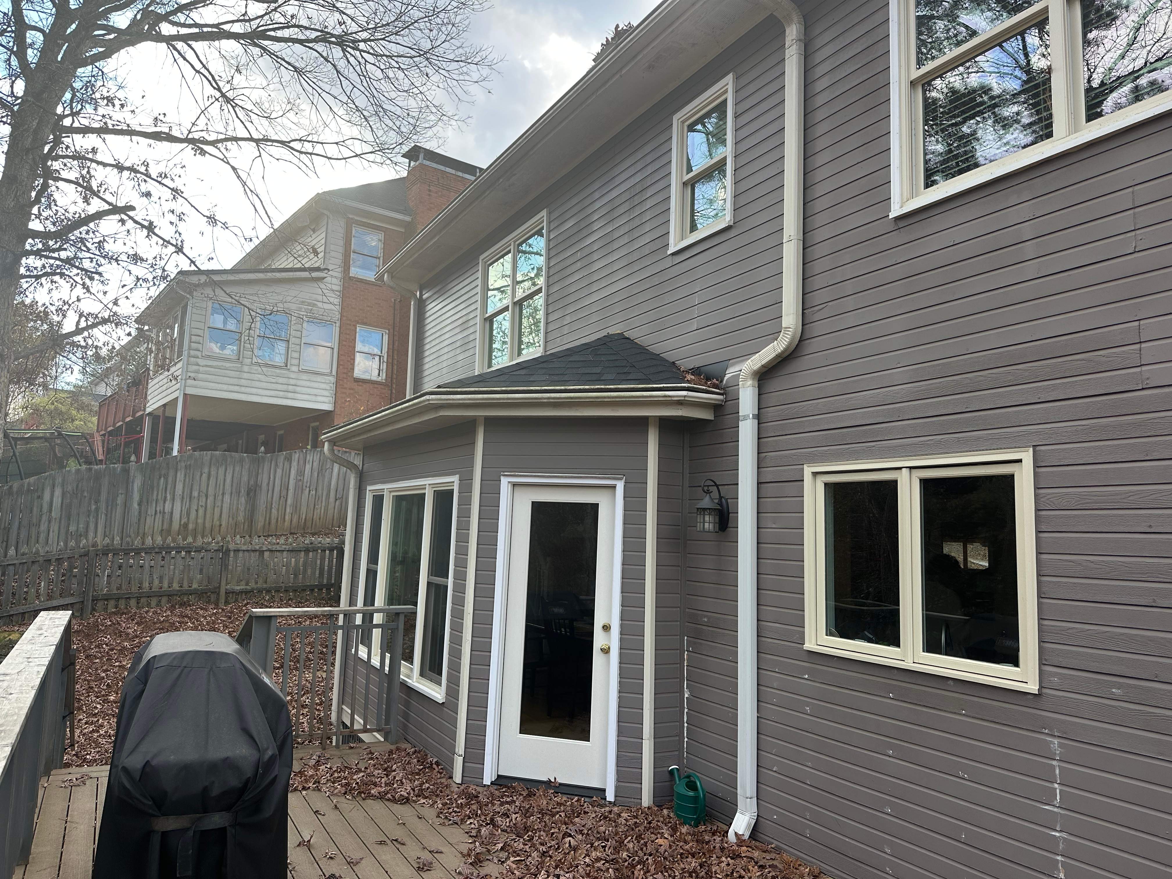 James Hardie Siding Replacement, Exterior Painting, Deck Stain, and Gutter Installation in Peachtree Corners, GA by Nelson Exteriors