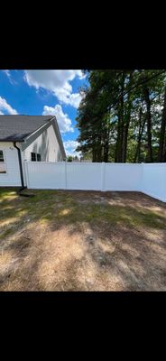 White Vinyl Privacy Fence with Solar Post Caps in Goldsboro