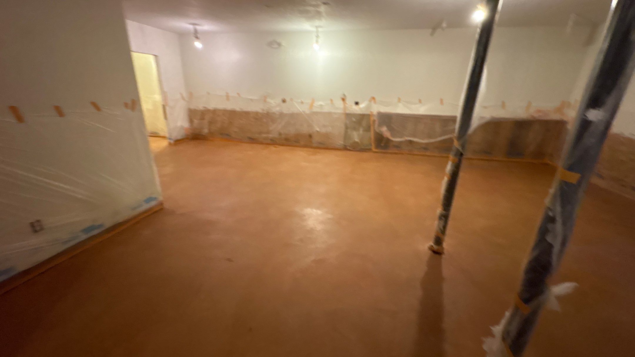 Basement Floor Remodel with Haven Reno KC by Big Red Decorative Concrete, LLC