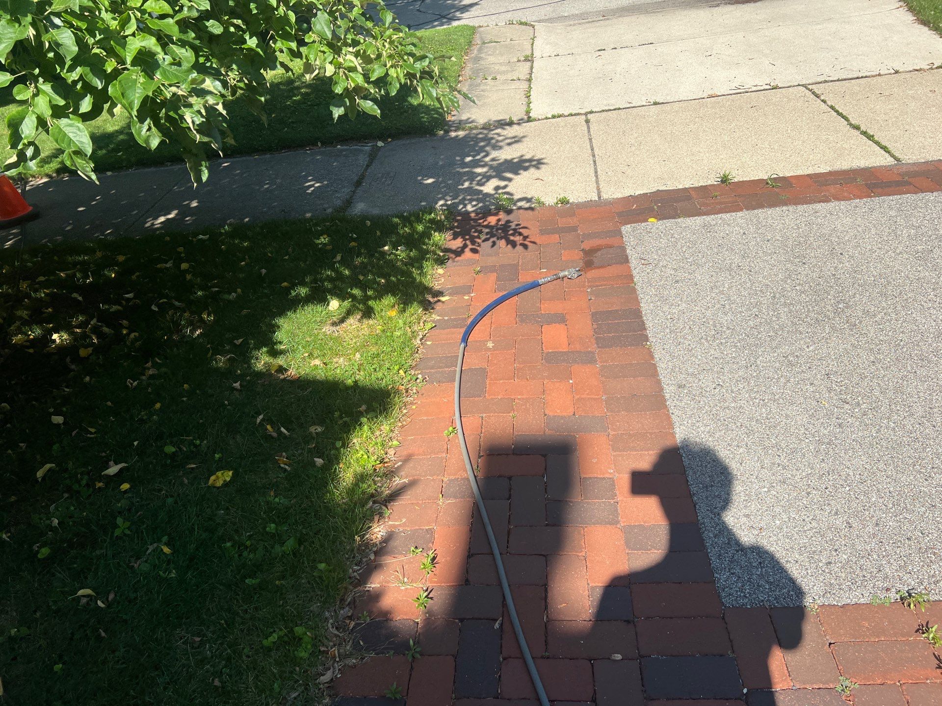 Brick paver cleaning and sealing by Northern Power Washing LLC.