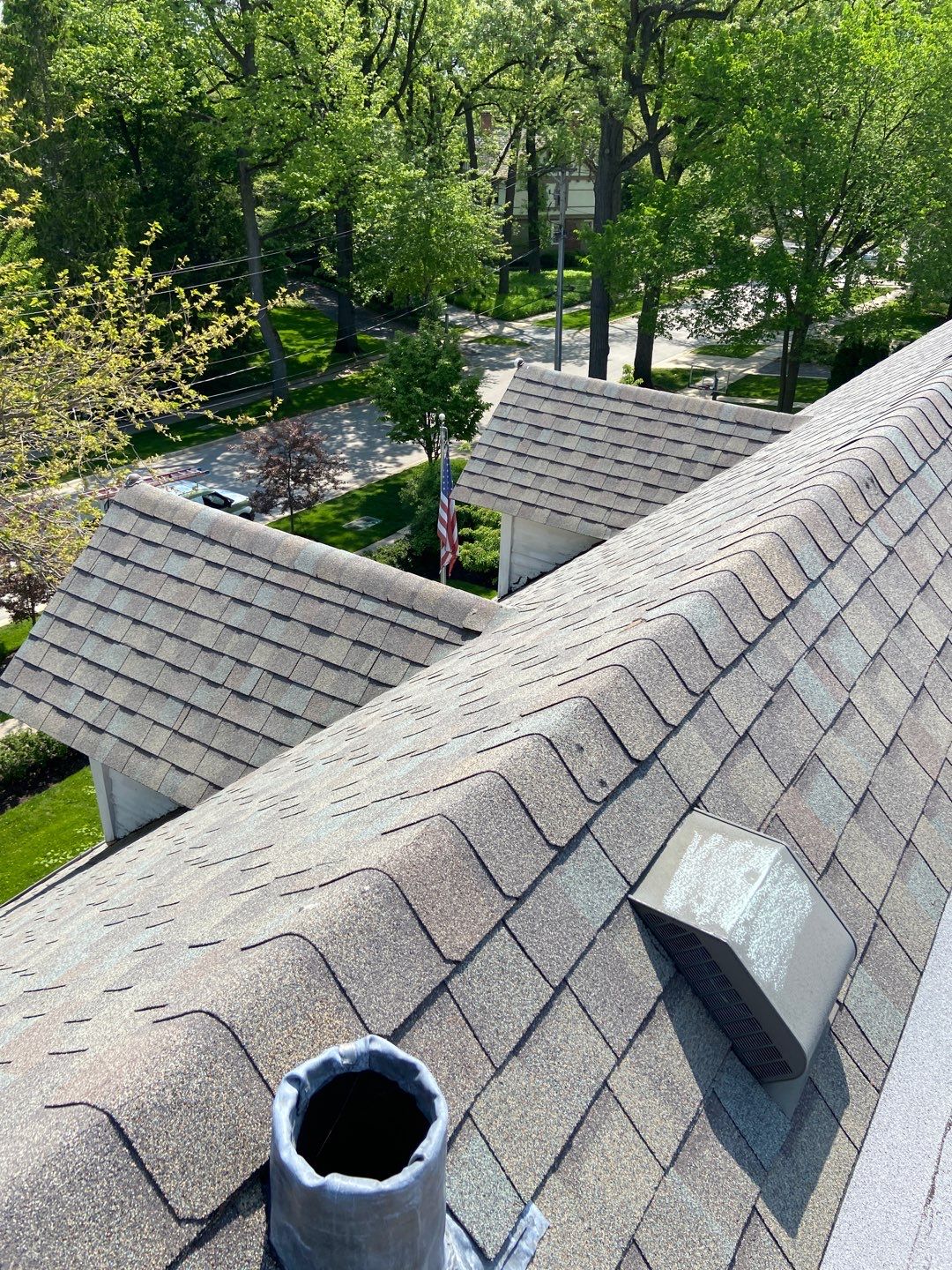 Asphalt Roof Replacement with Half Round Copper Gutter Installment by Custom Installations