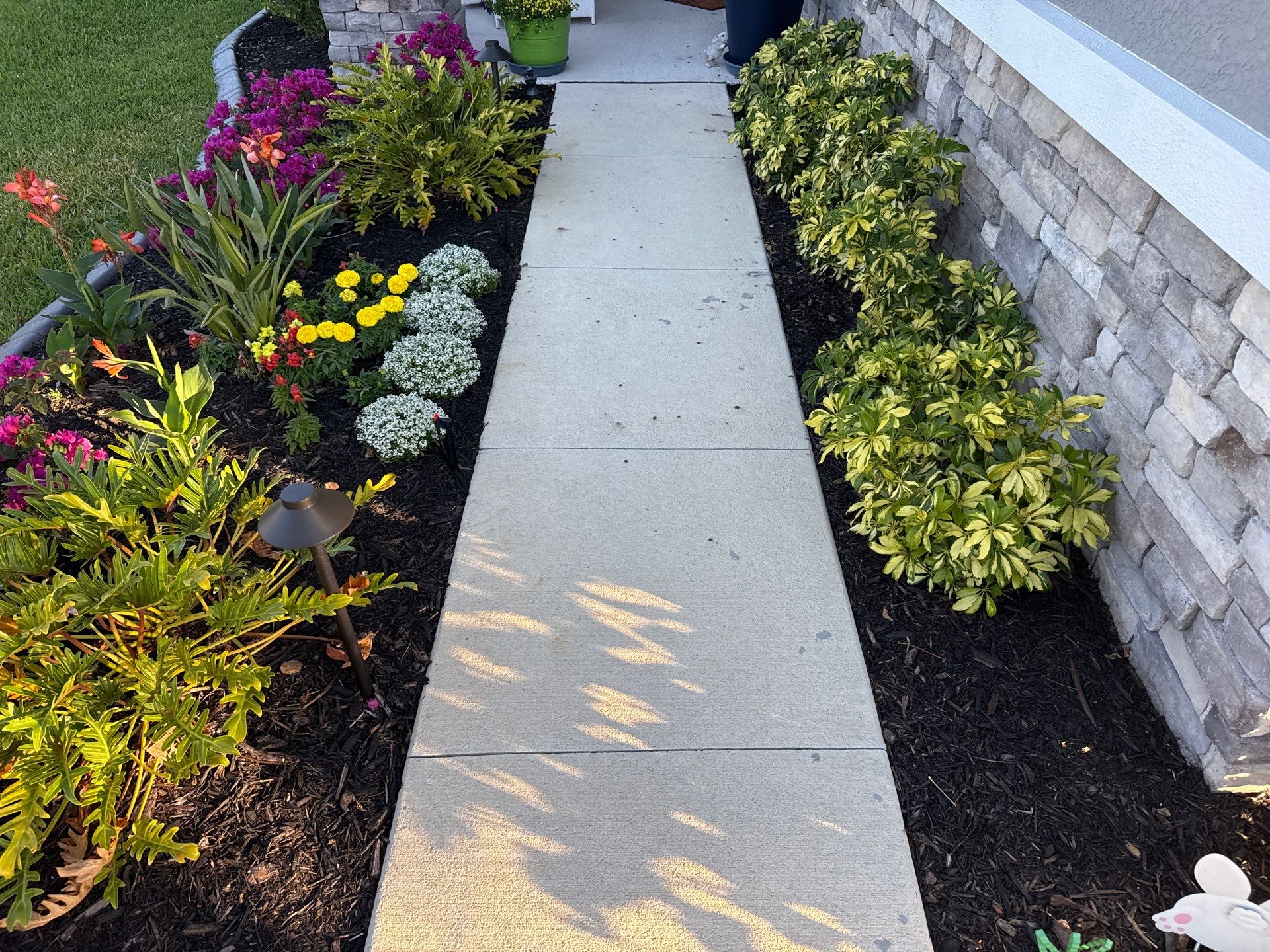 Rust Stain Removal from Concrete Driveway and Pavers in Park East at Azario | Lakewood Ranch, FL by Sunshine AquaWash