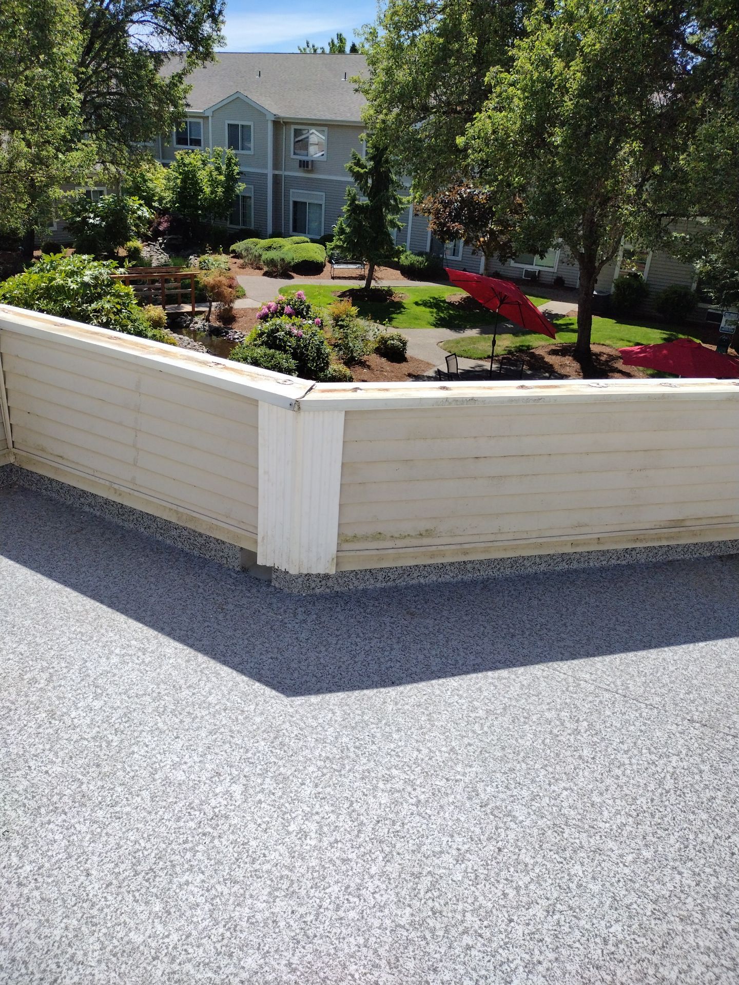 Dec-Tec Walkable Membrane using Dec-Tec (Color: Granite) by Orezona Building & Roofing Company, Inc.