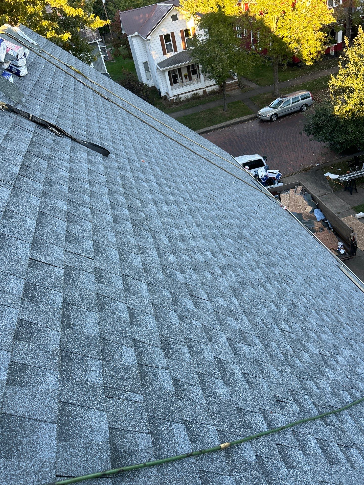Residential Roofing Installation using GAF Timberline HDZ Oyster Grey by Rainstoppers Roofing