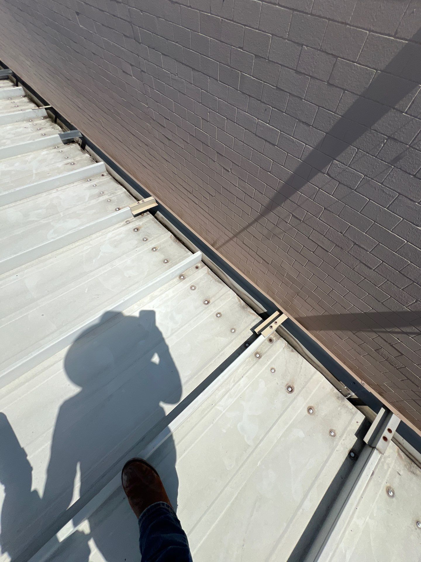 Commercial Roofing Repair using Metal by Roof Repair Company