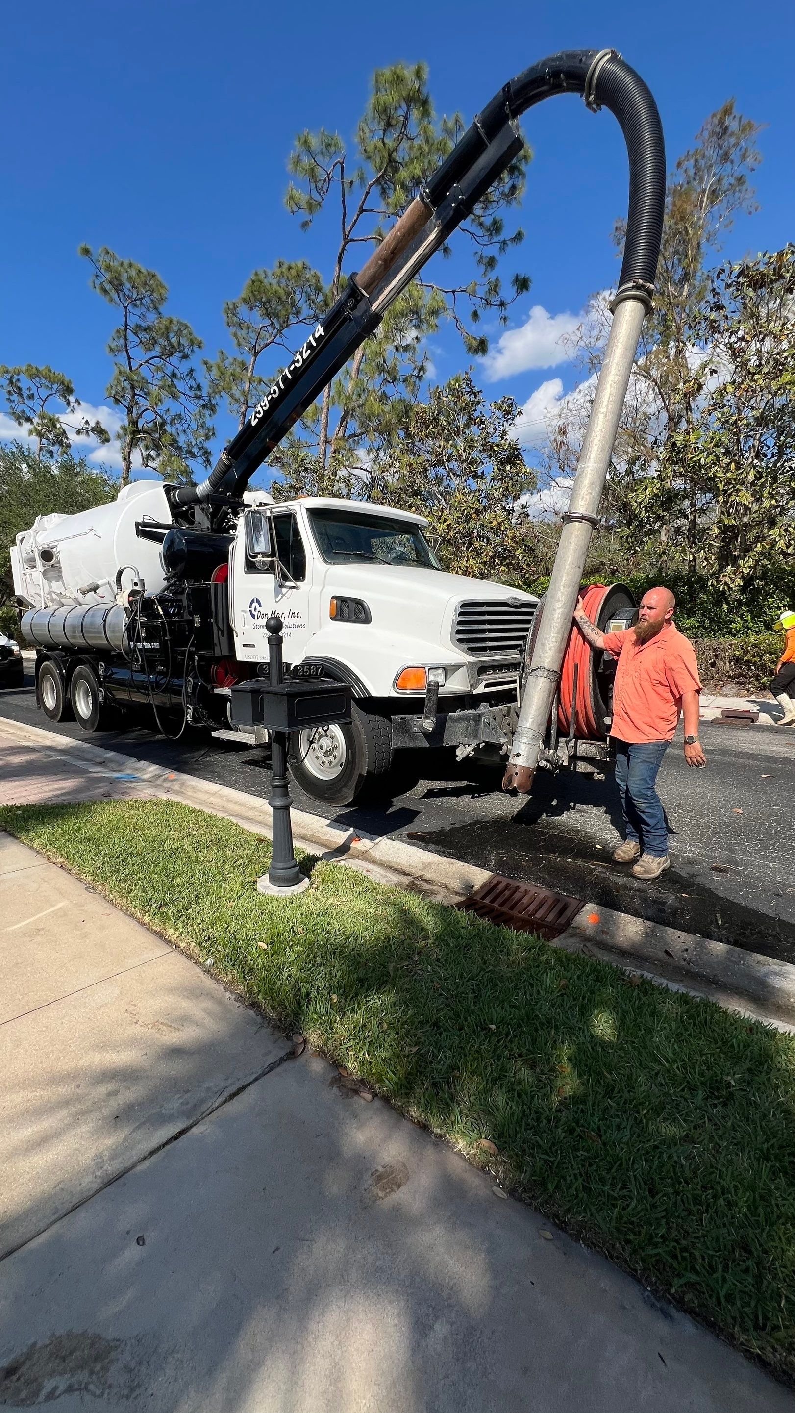 Cleaning Debris Filled Catch Basins by APS Power & Water