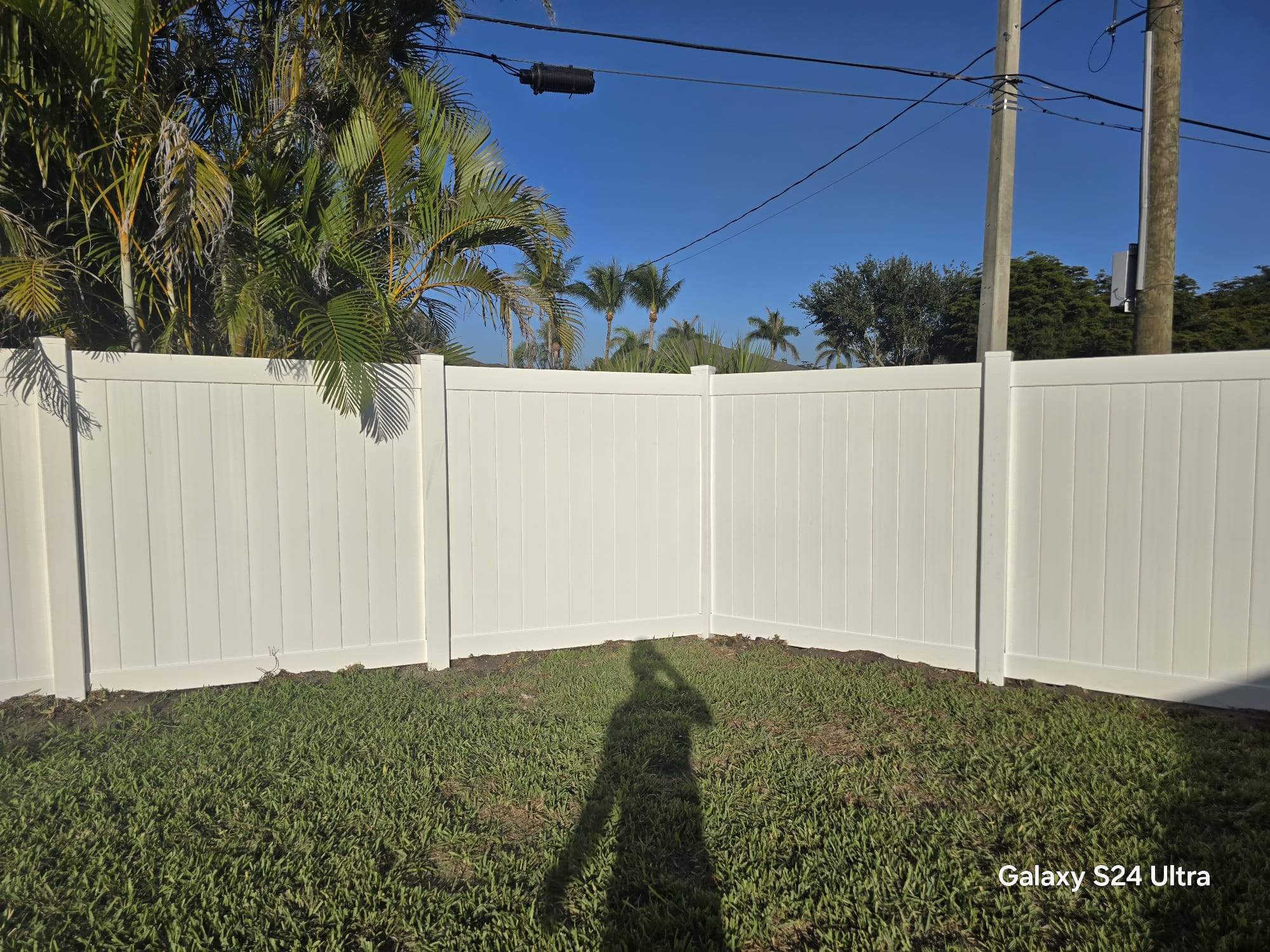 White Vinyl Privacy Fence and Double Gate Installation in Fort Myers by True Fence LLC