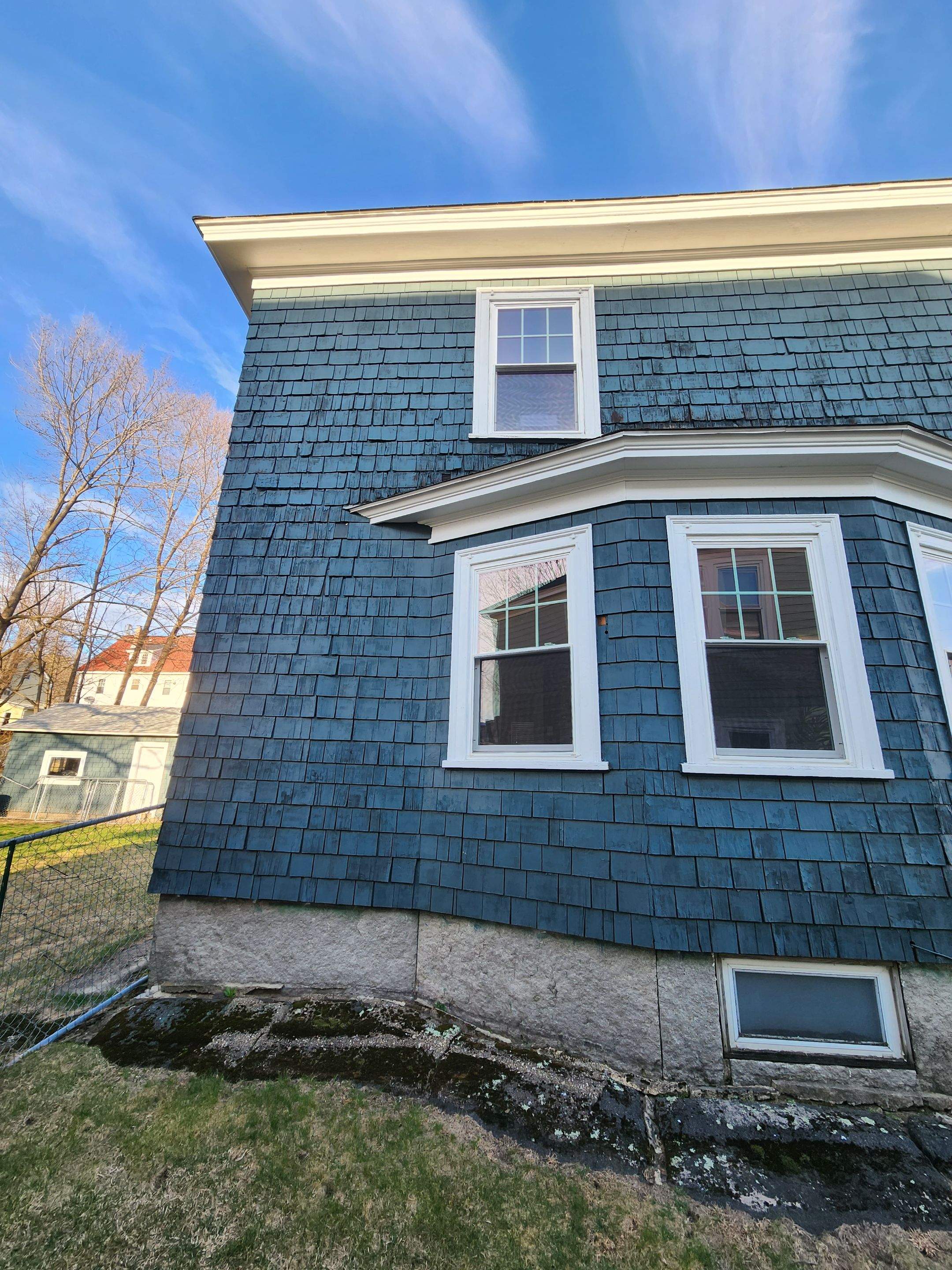 Siding replacement using cedar shakes by Freedom Handyman Services