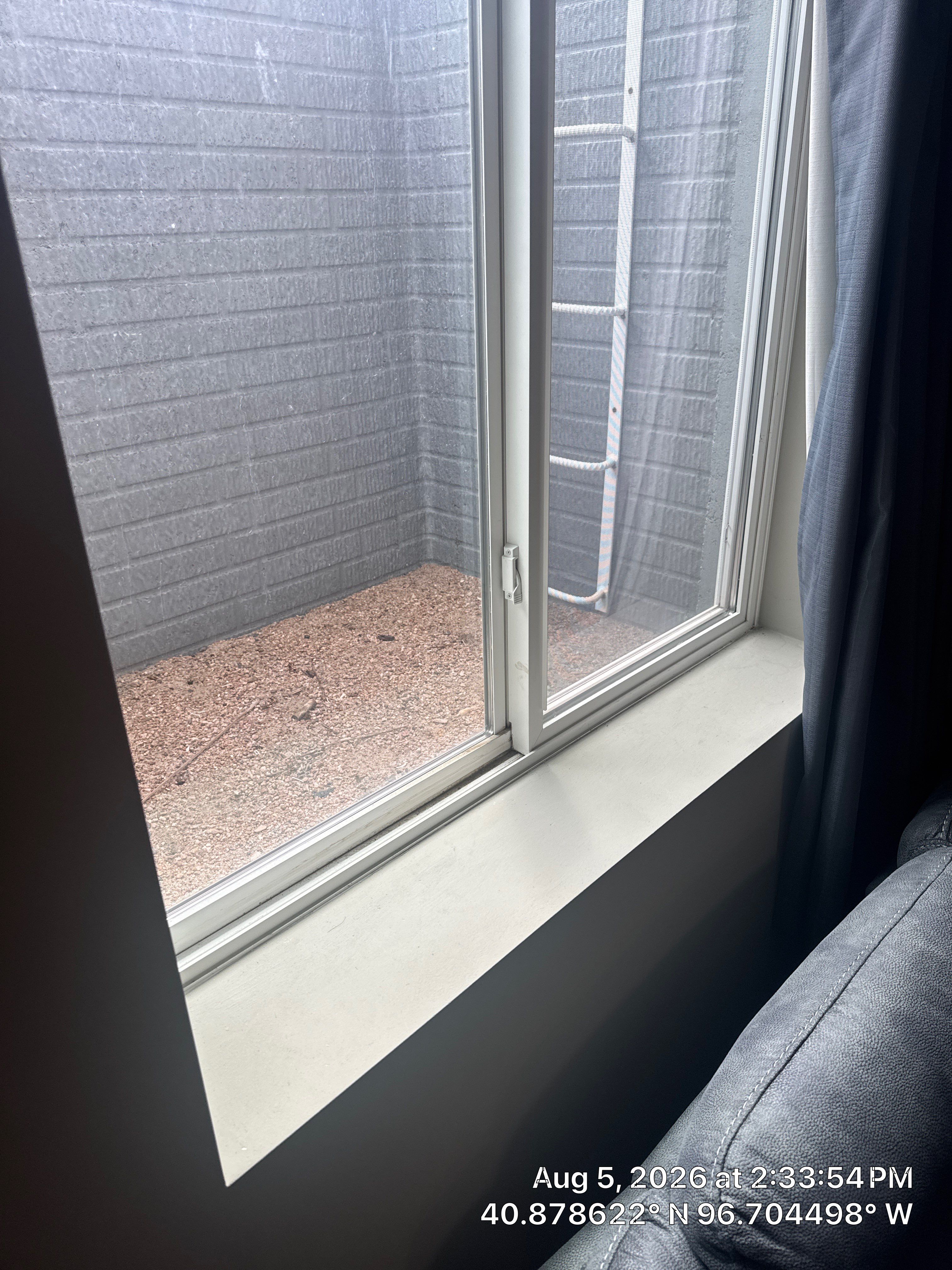 Basement Egress Window Installation with Stone-Textured Liner in Lincoln by CompanyCam Sales Demo
