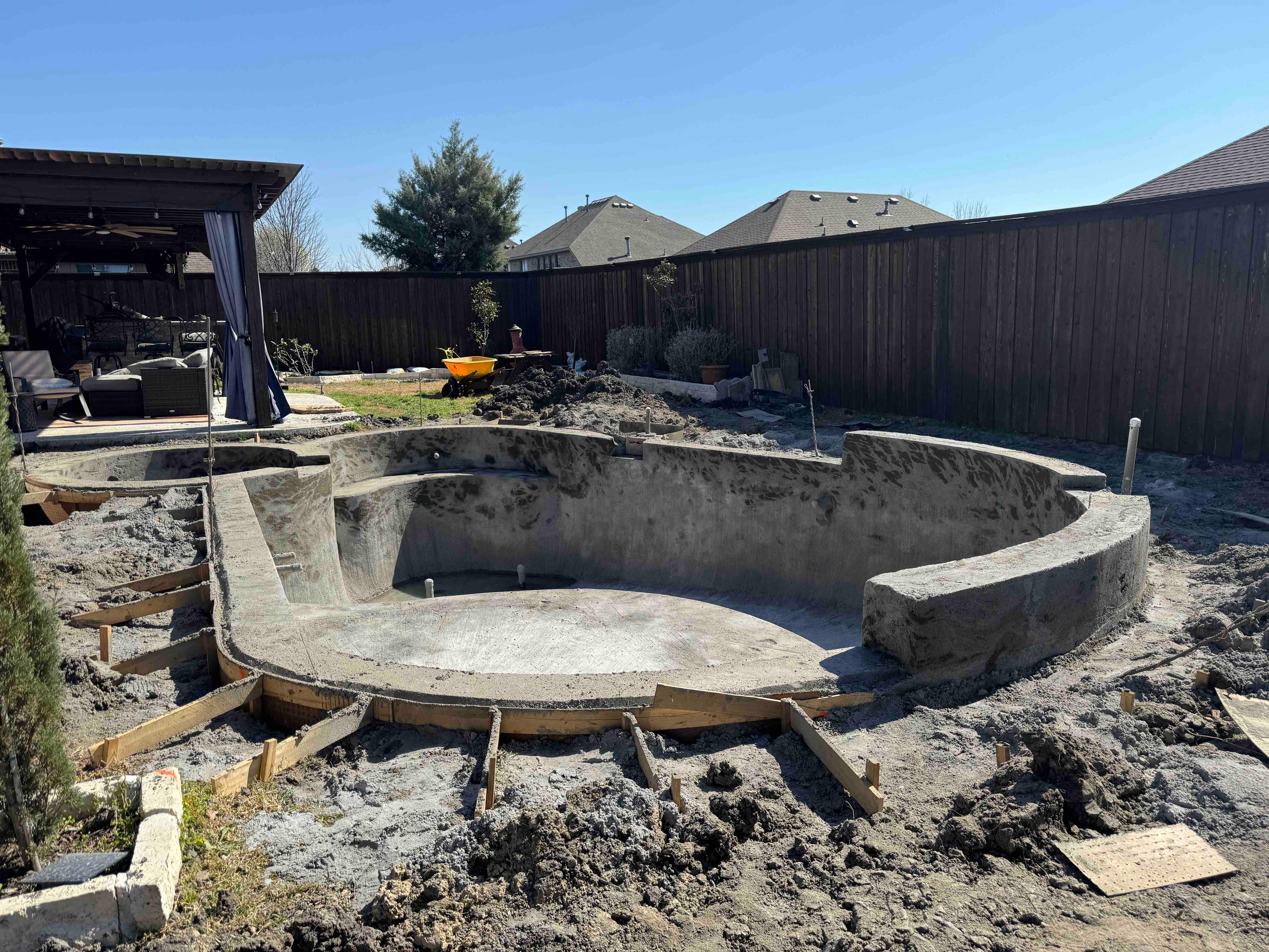 Freeform Pool with Raised Spa and Stone Veneer by Pinnacle Pools and Spas - DFW