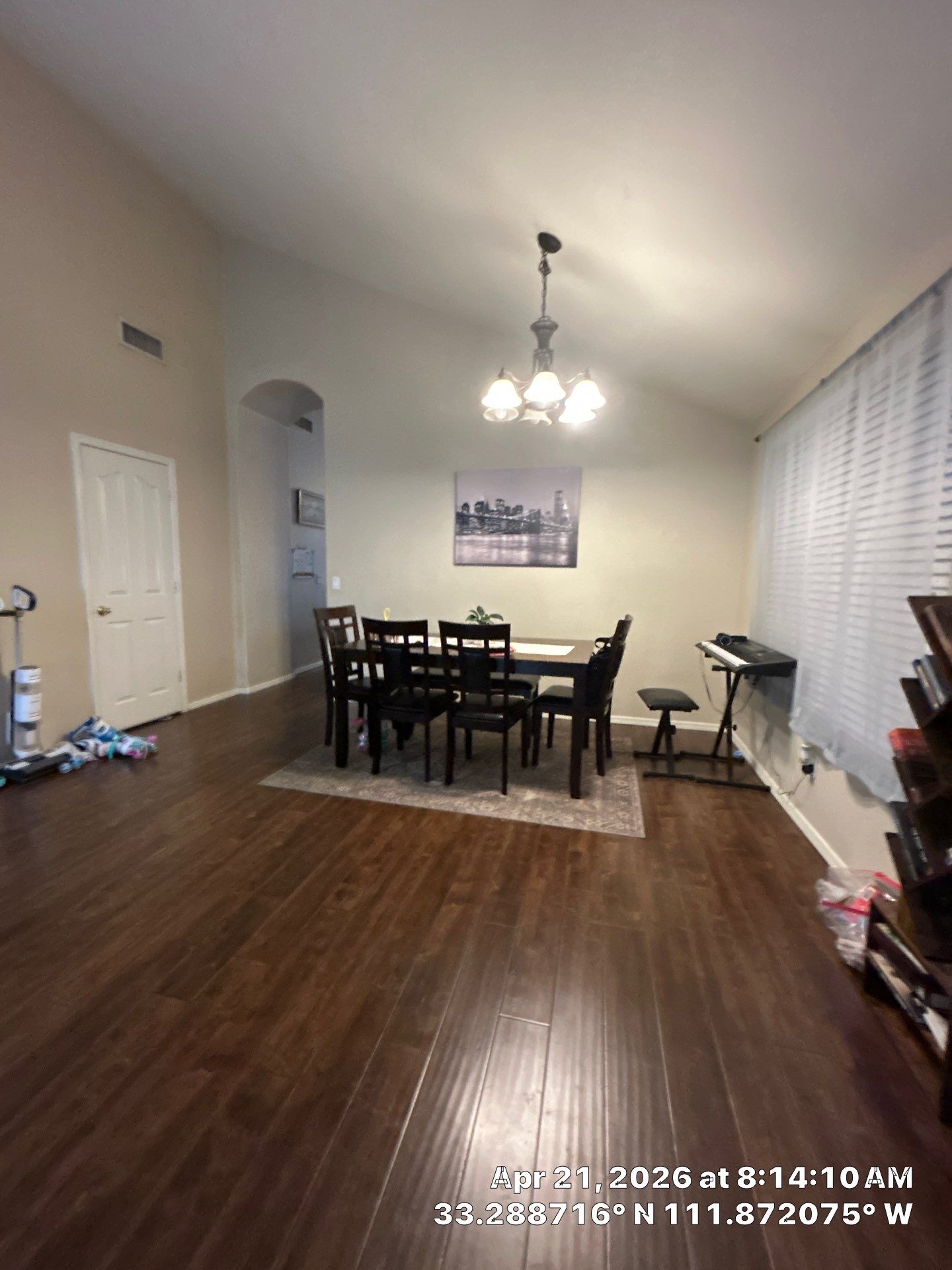 Dark Wood Laminate Floor Installation and Dining Room Renovation in Chandler by CompanyCam Sales Demo