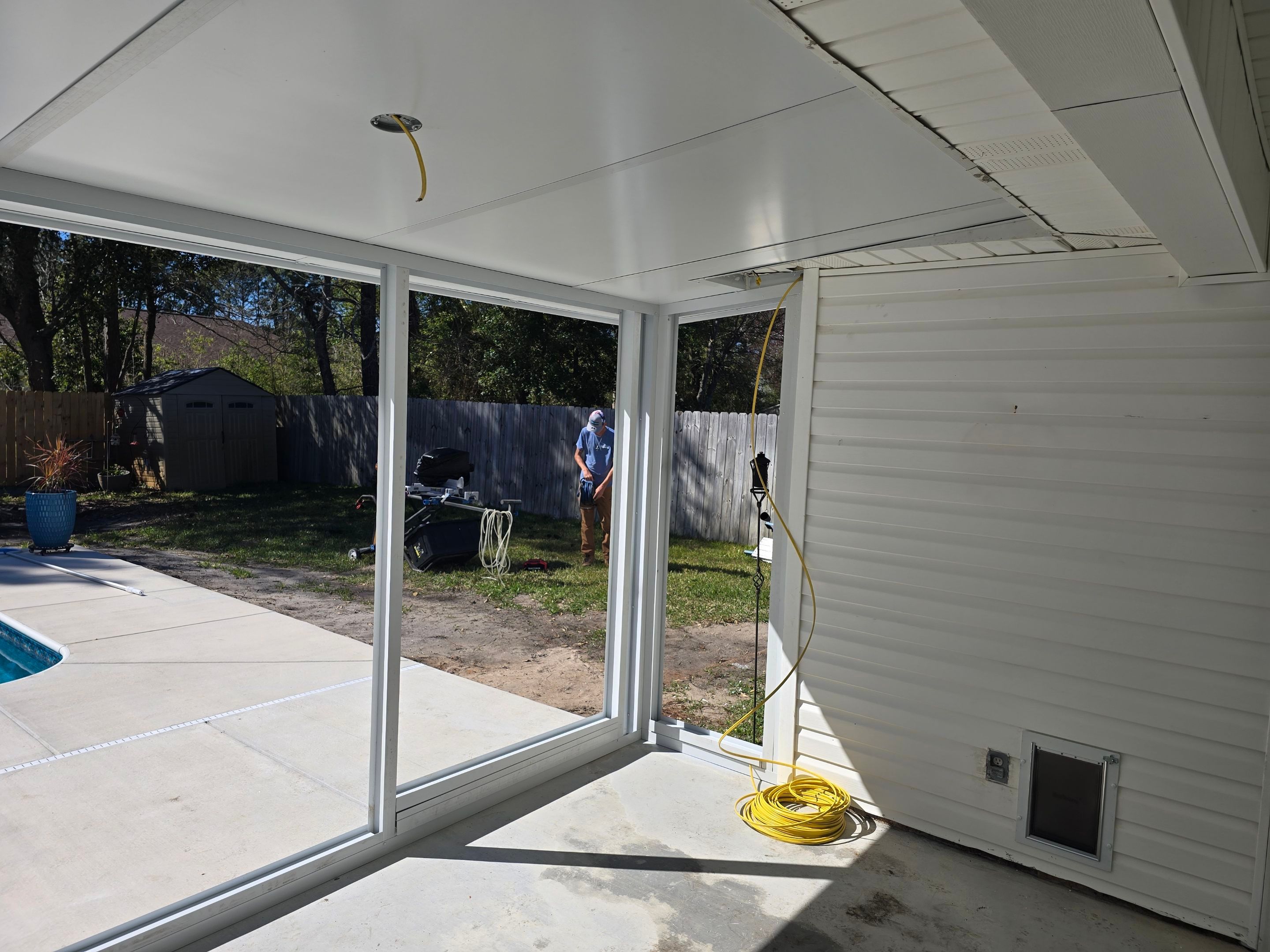Poolside Glass Room in Gulf Breeze by Titan Sunrooms