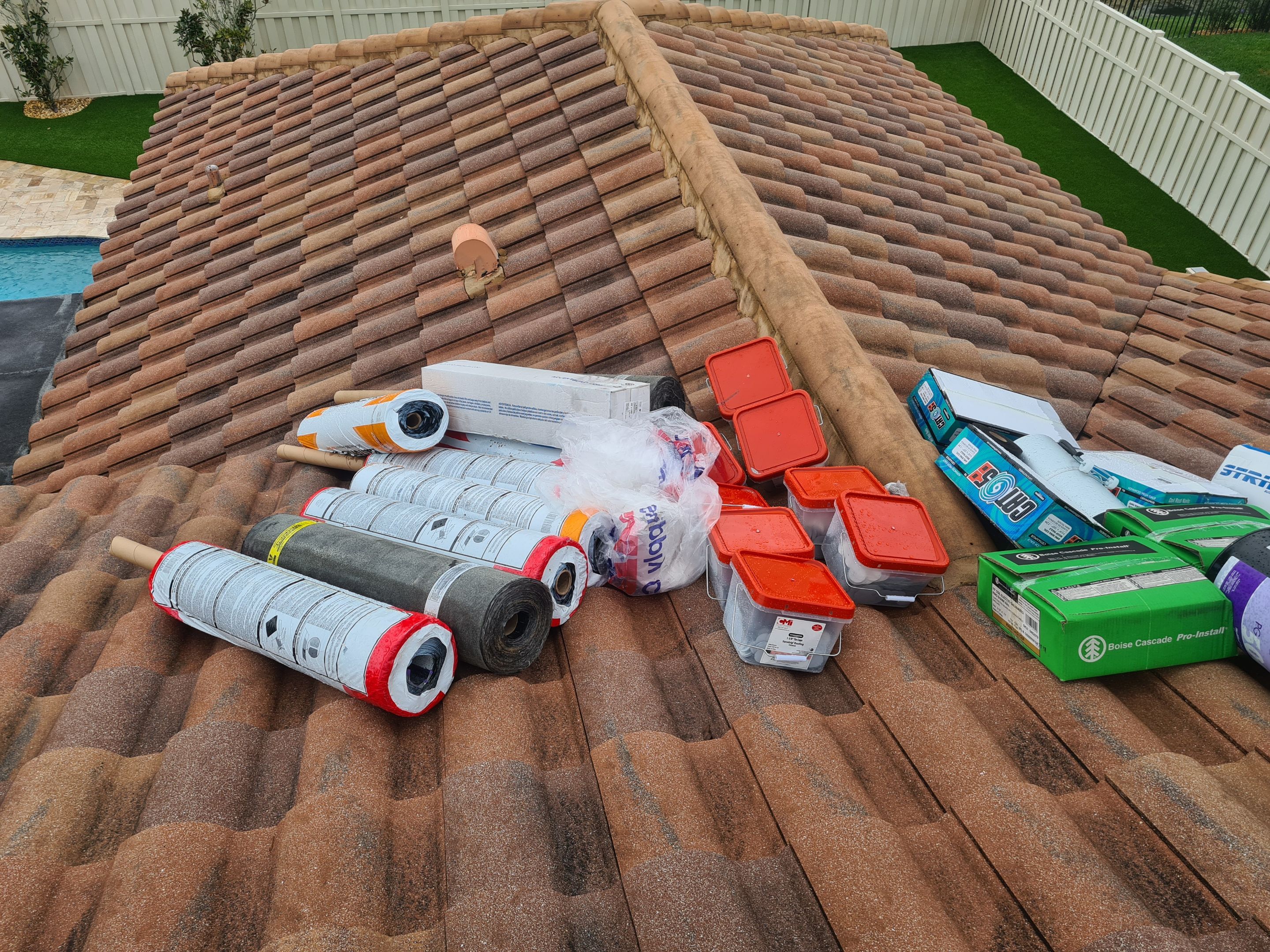 Residential Roofing Installation using 1" Nail strip metal roof by BLUES BROTHERS CONSTRUCTION CORP