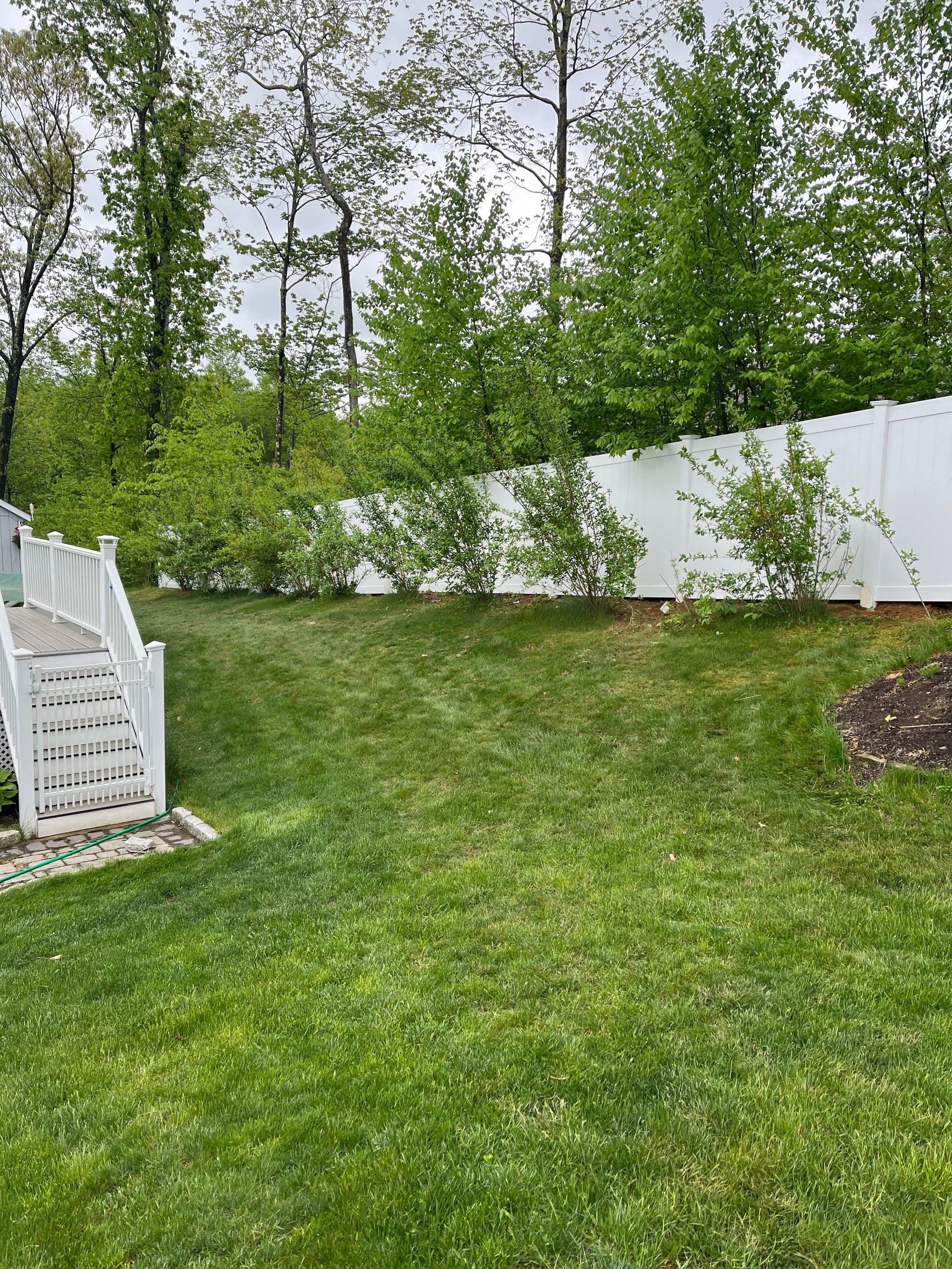 New Vinyl Privacy Fence in White by DiGiorgi Roofing and Siding Inc