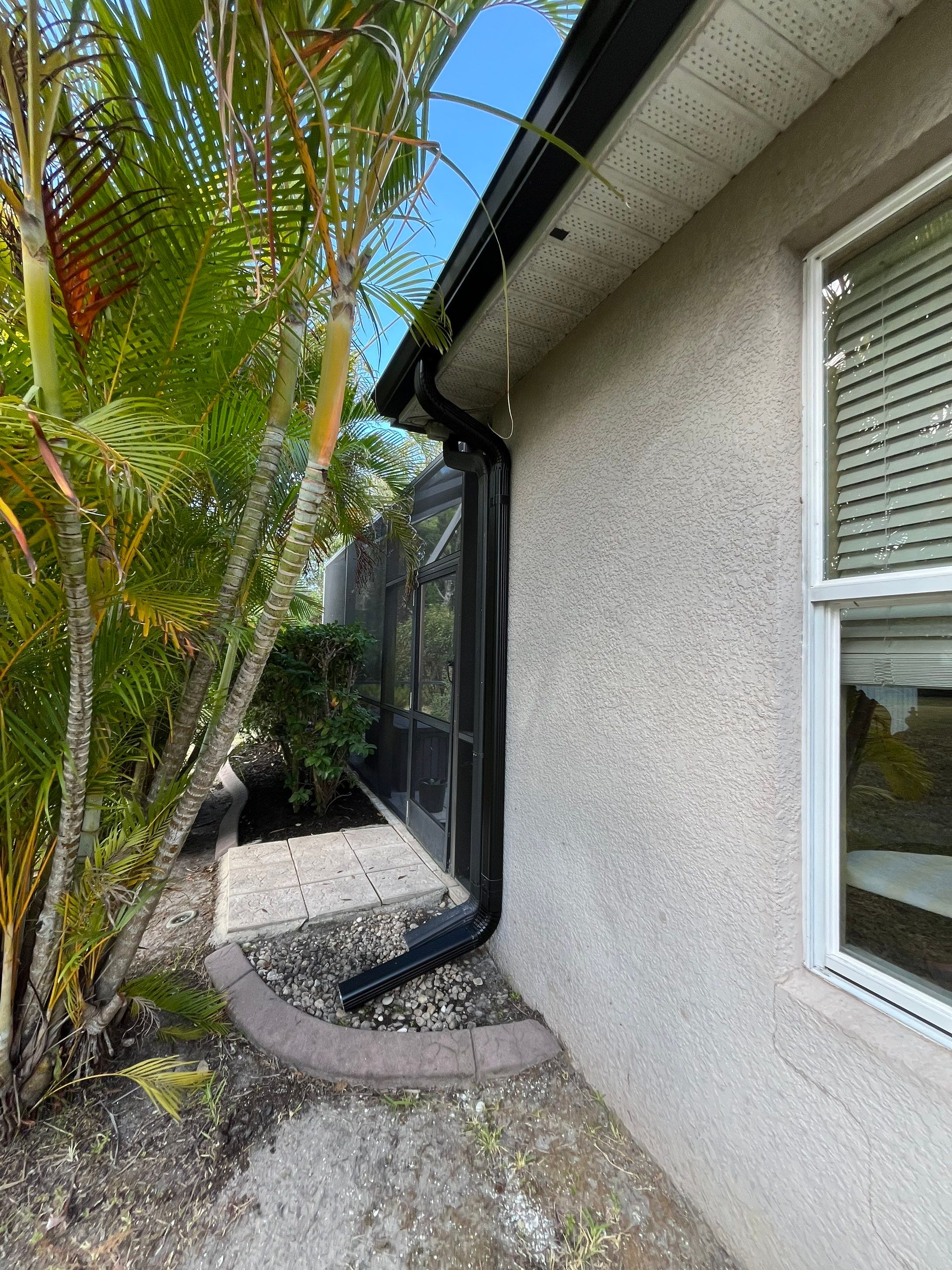 Black 6-inch Seamless Gutters for Modern Ellenton Homes FL by Gutter Professors
