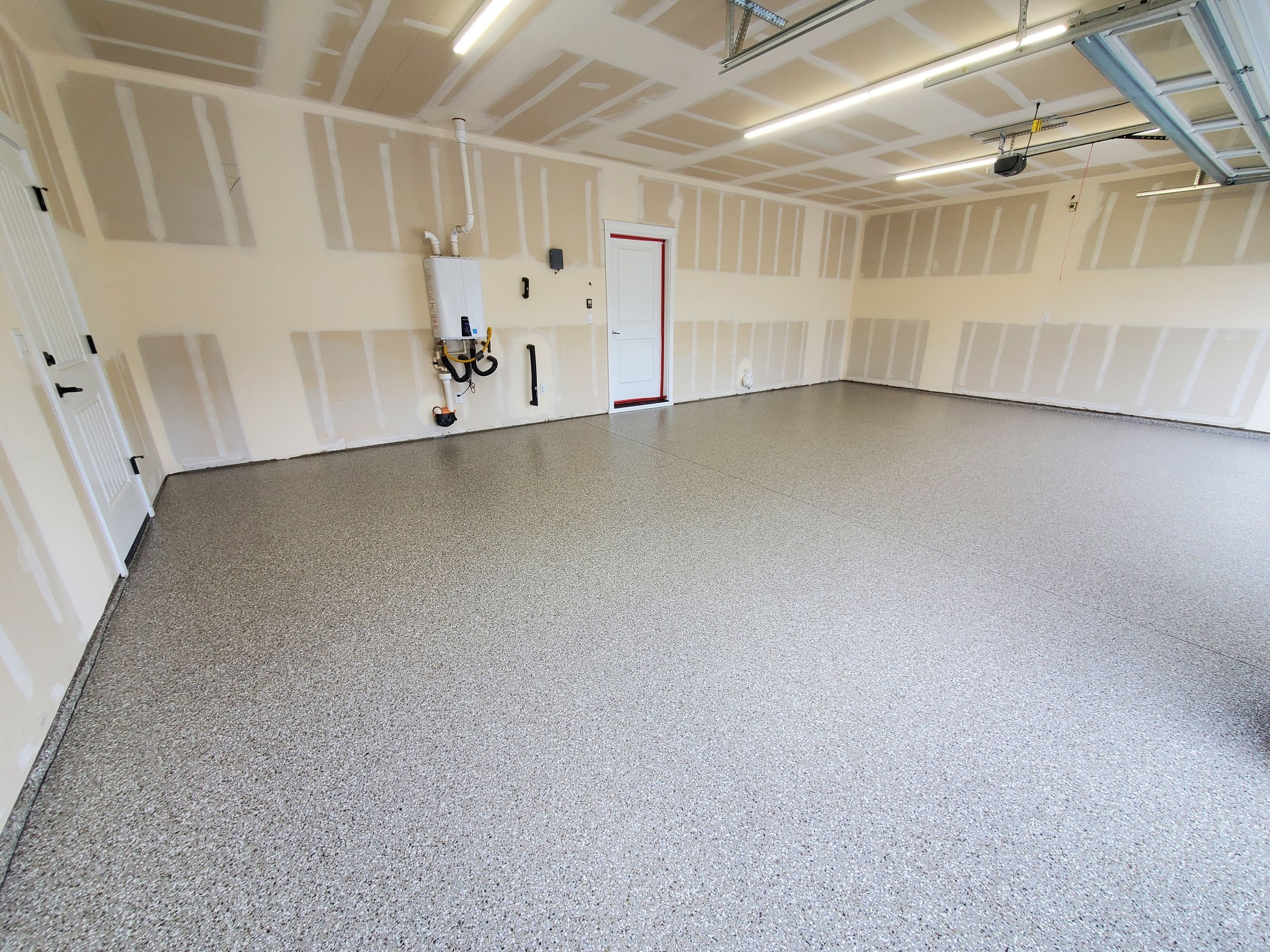 Garage Transformation using Pebble Beach by Croc Coatings, LLC