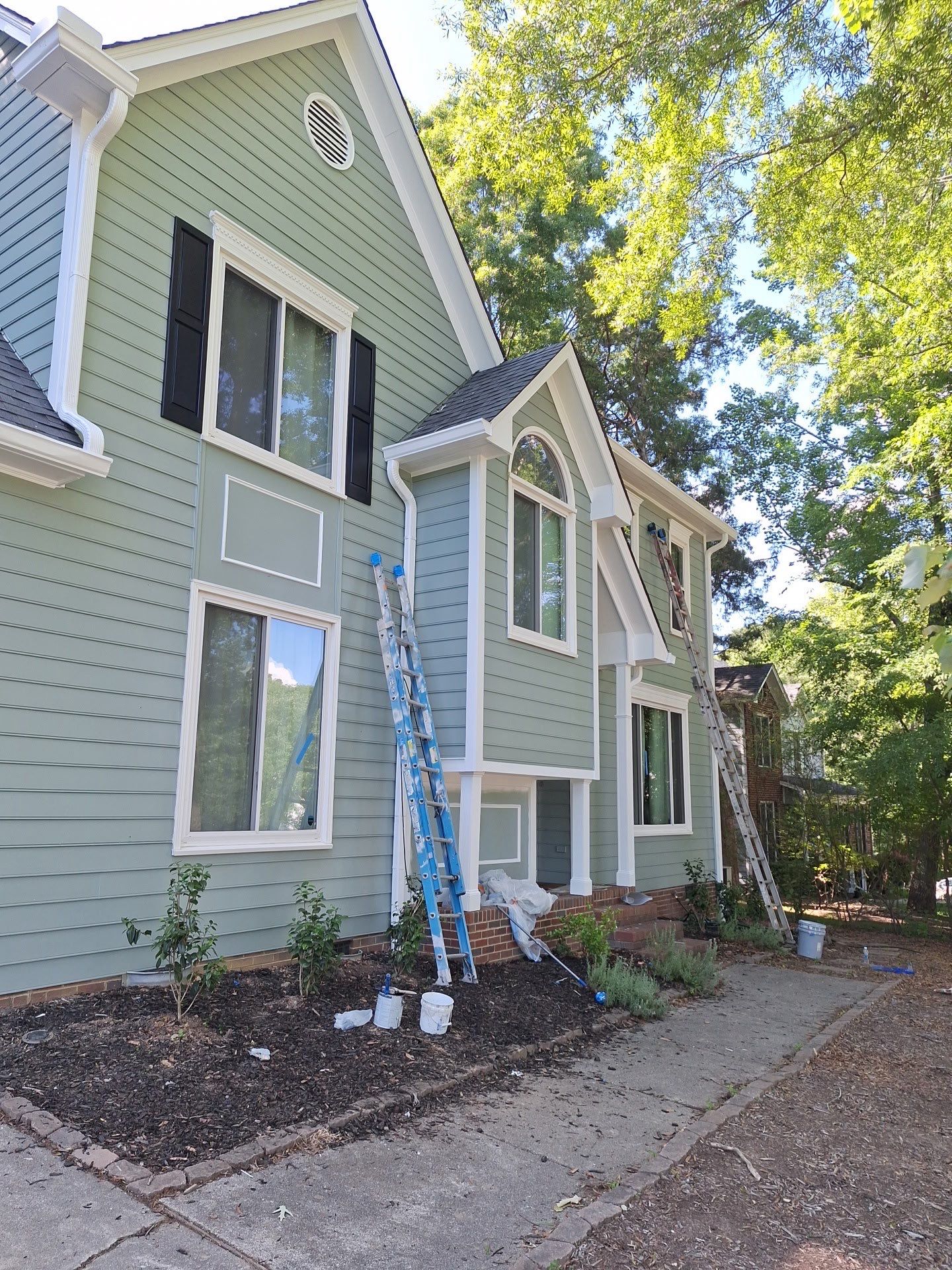Siding Replacement and painting by GonzalezPainters & Contractors Inc 