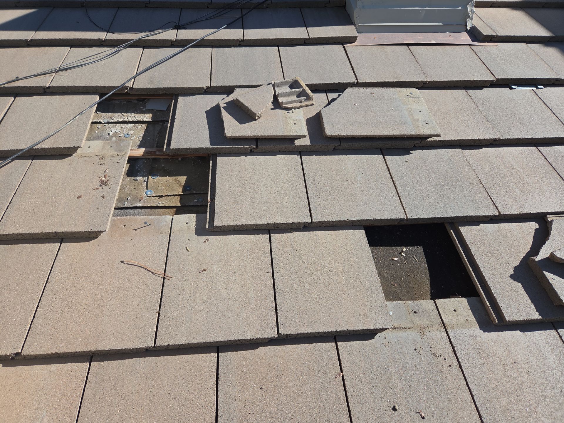 Broken Tile Replacement by RTP Roofing Company