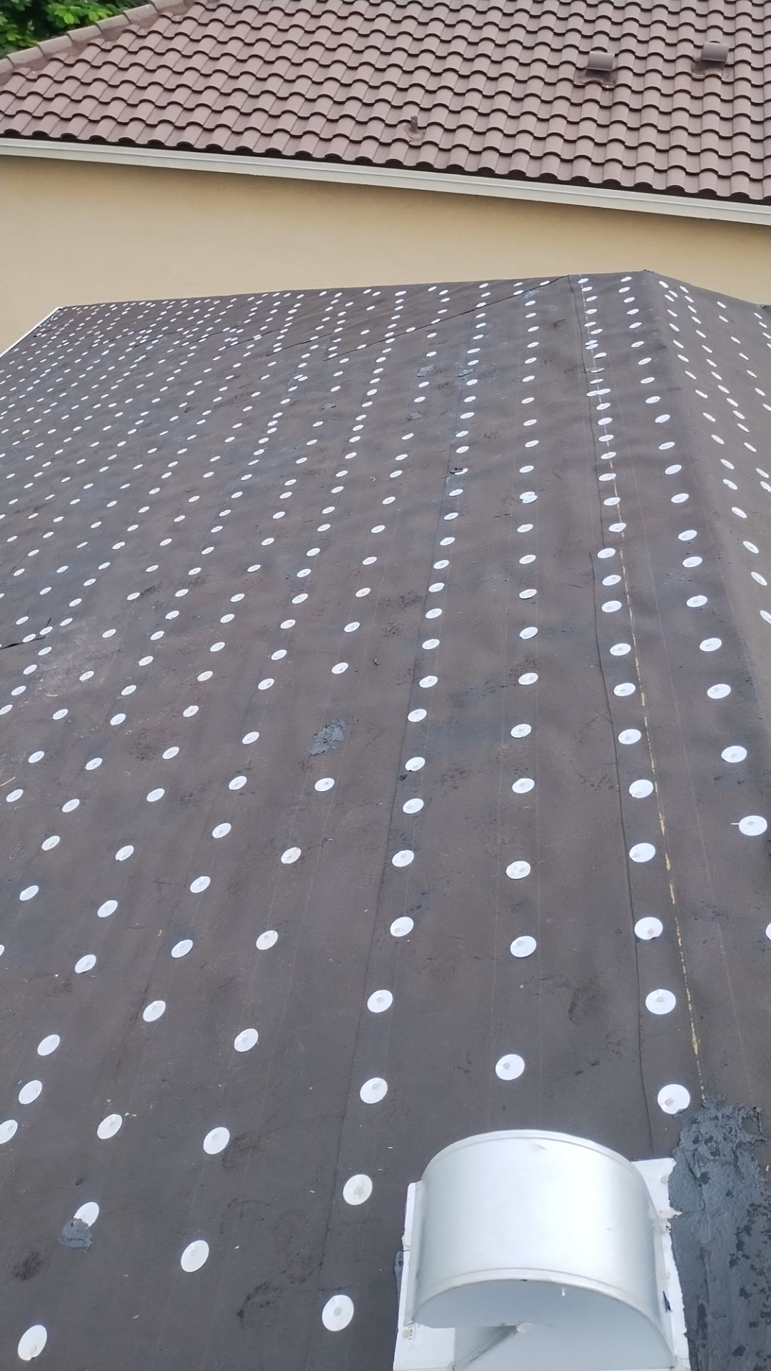 Residential Roofing Installation using 1" Nail strip metal roof by BLUES BROTHERS ROOFING