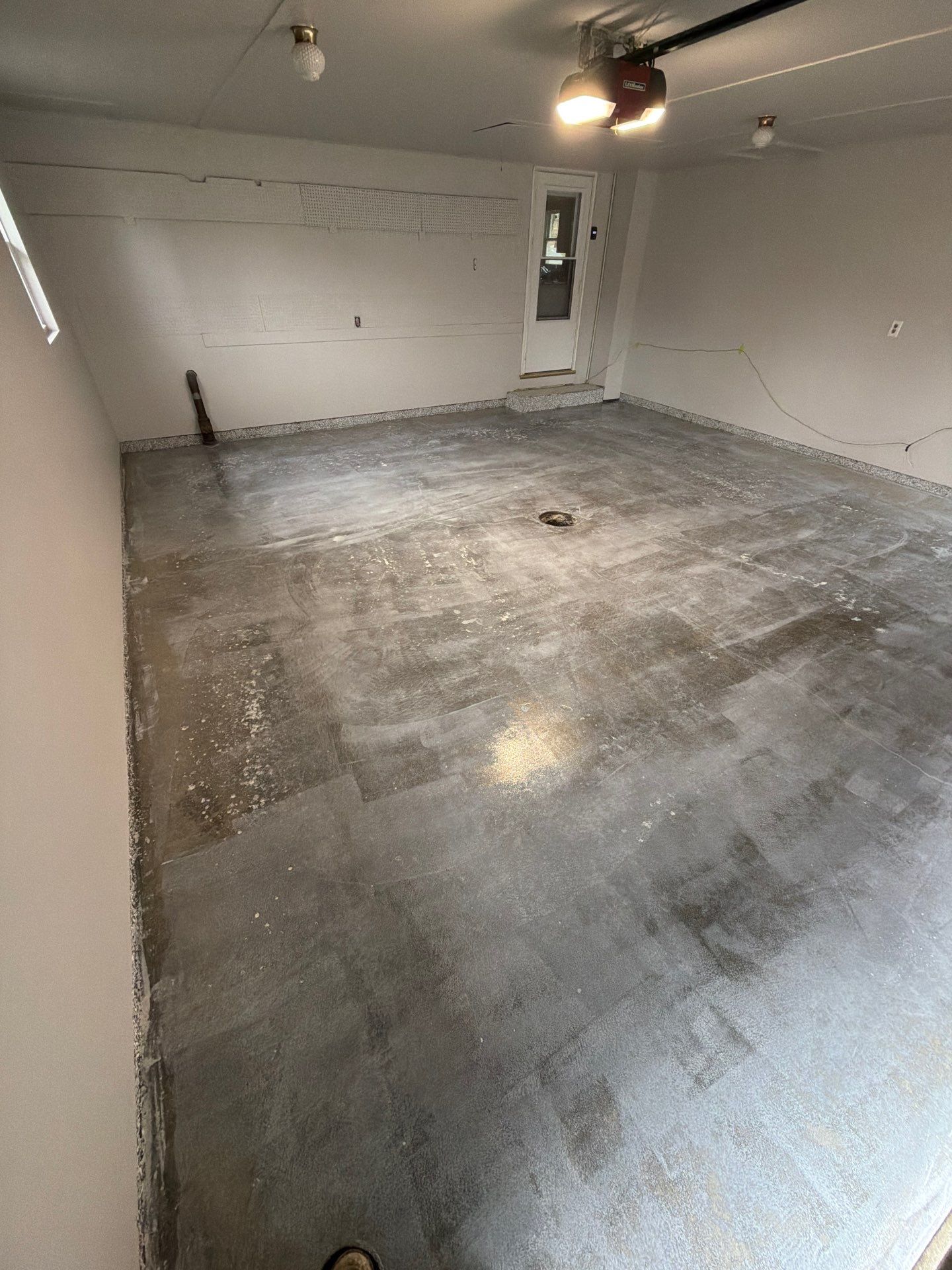 Muskegon Garage Interior Painting and Epoxy Flake Floor Installation by Gordon Painting