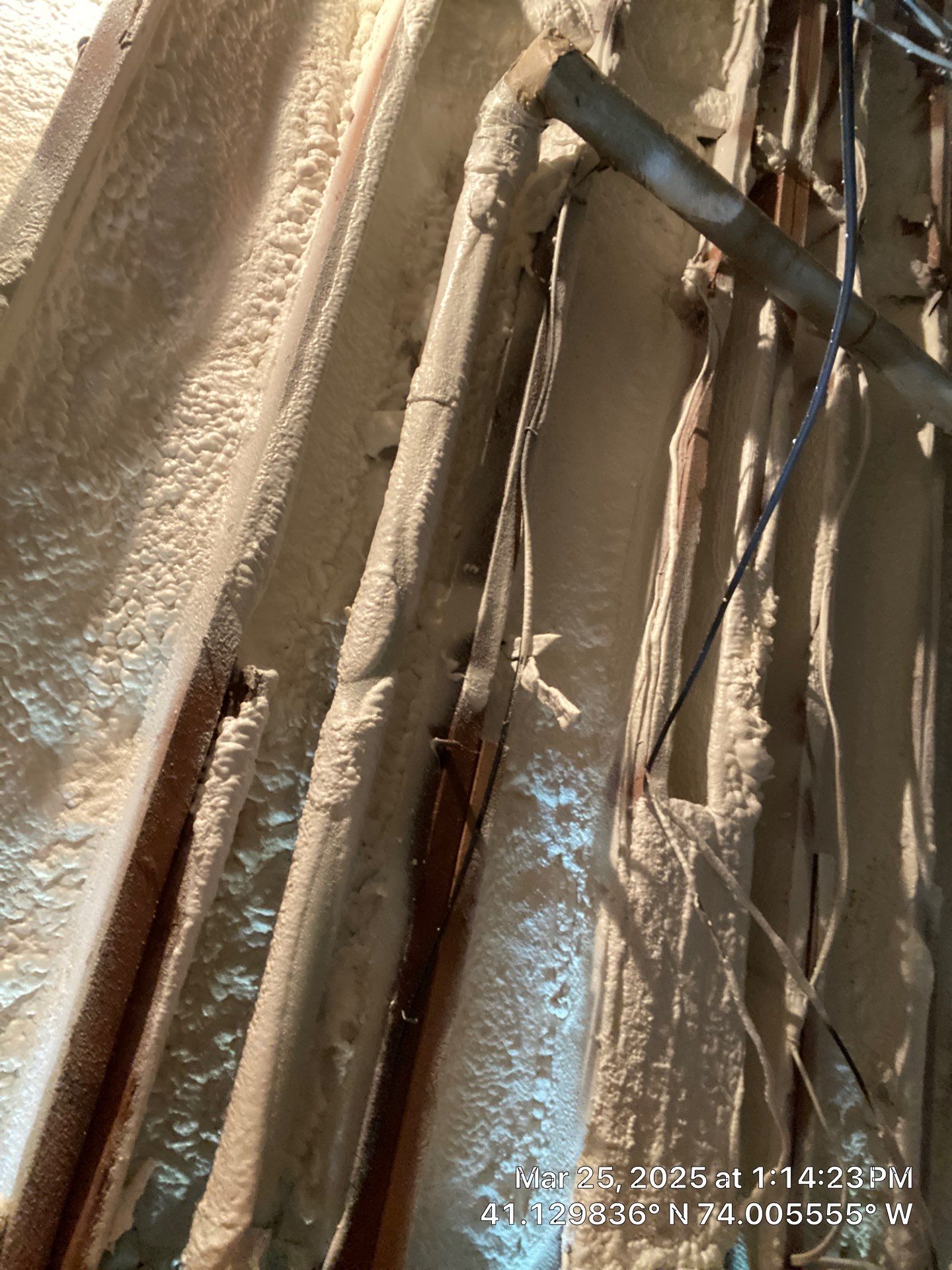Attic Insulation using open cell spray foam and closed cell rim joist by NYS Foam & Energy
