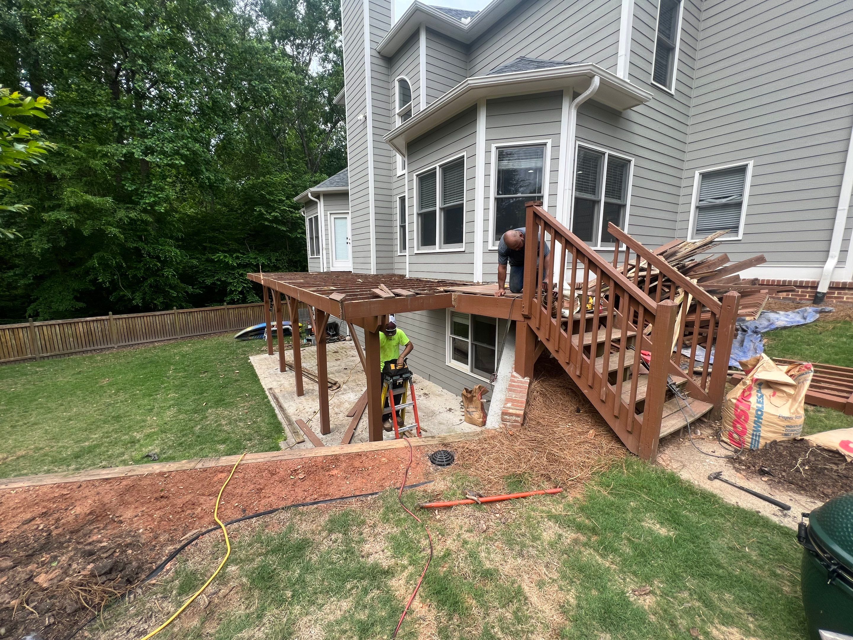 Elevated Wood Deck Replacement and Staircase Installation in Woodstock by Swift Home Renovations