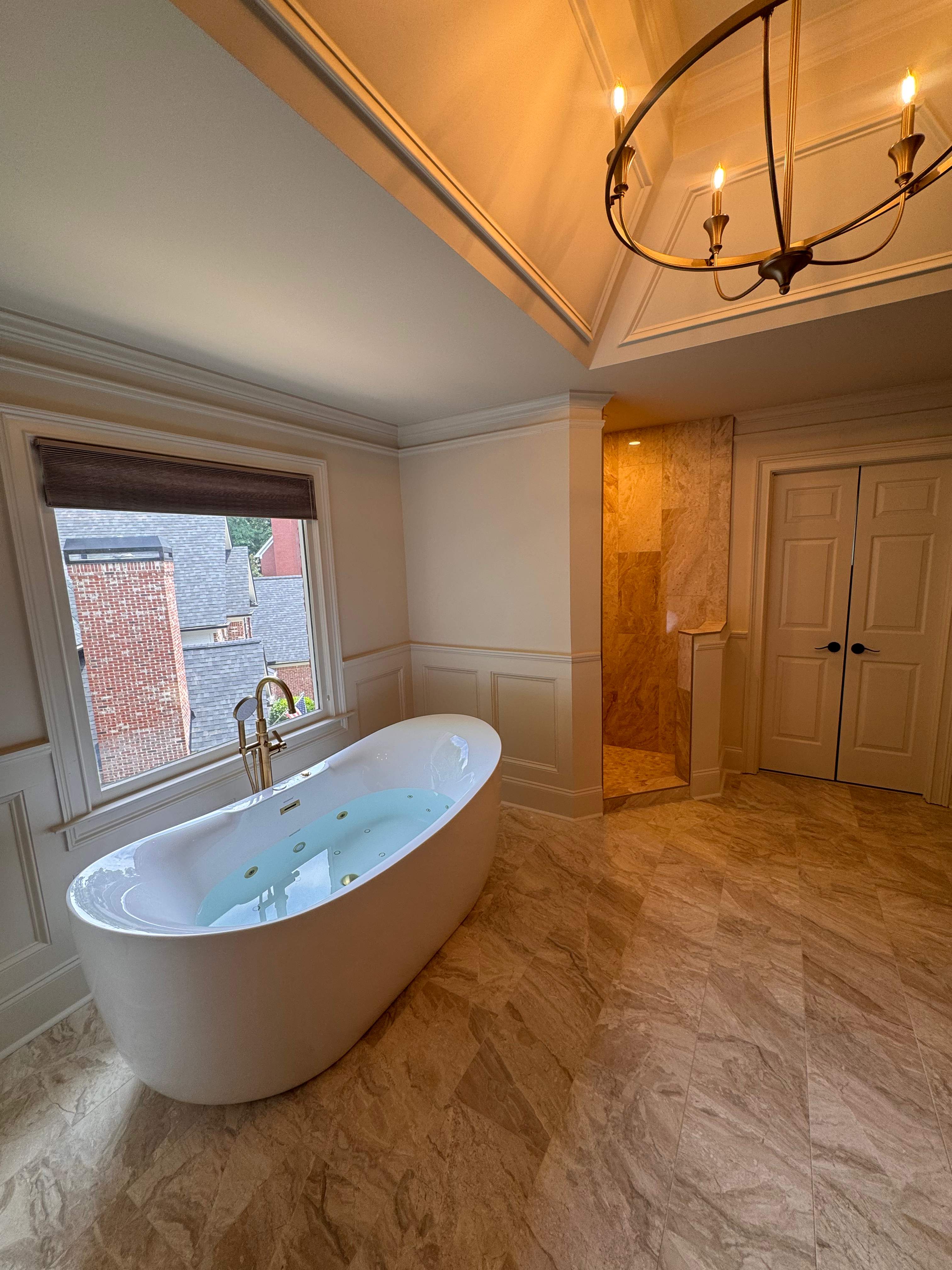 Master bathroom renovation using Free standing tub by Prudencio