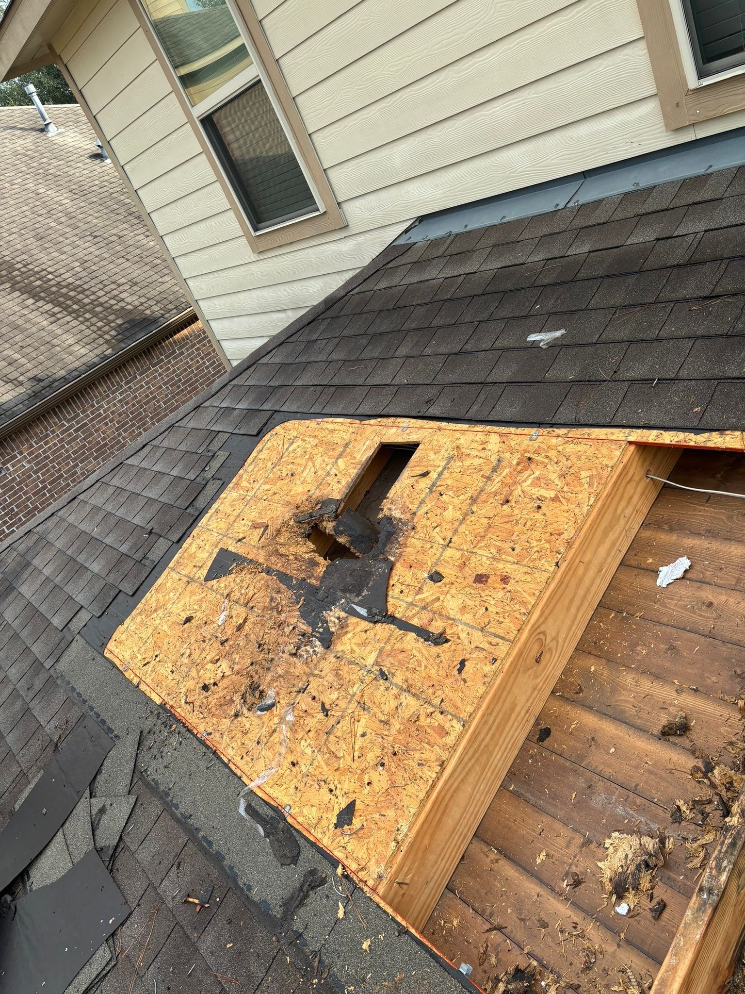 Hail Damage using Owen's Corning Duration (Lifetime) Shingles by Roof Repair Company