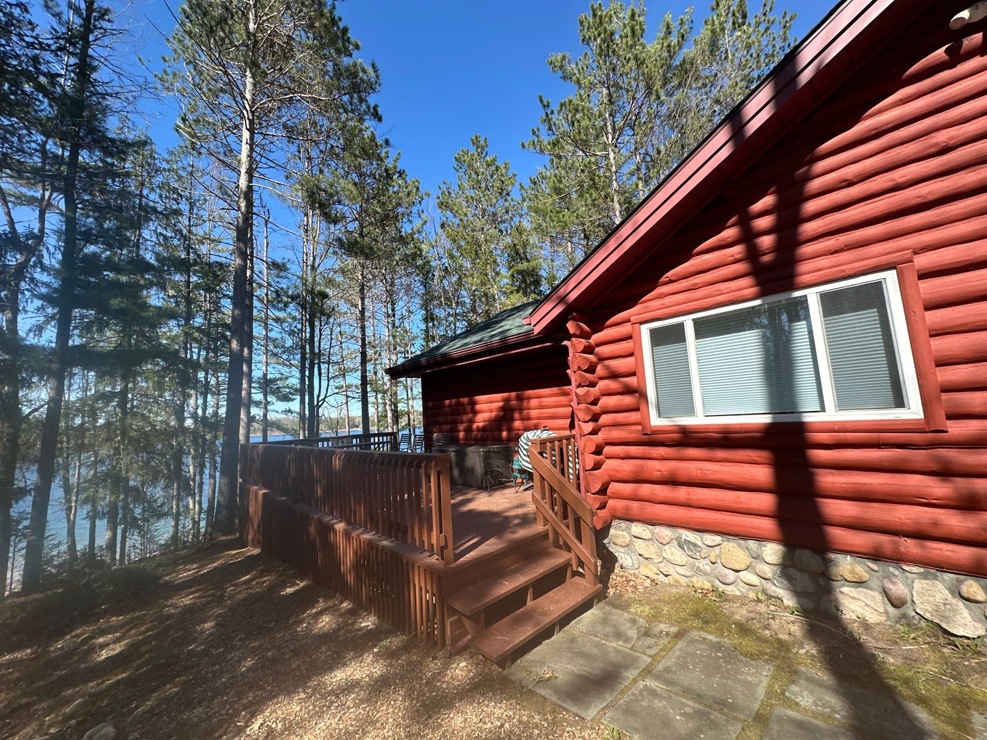 Gutter Helmet Protection System for Wooded Log Cabin in Johannesburg by Rainbow Seamless Systems